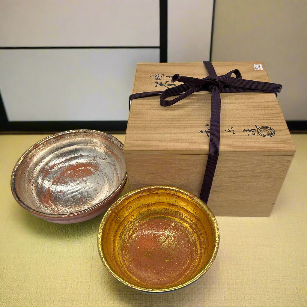 Japanese raku bowls with silver and gold leaf
