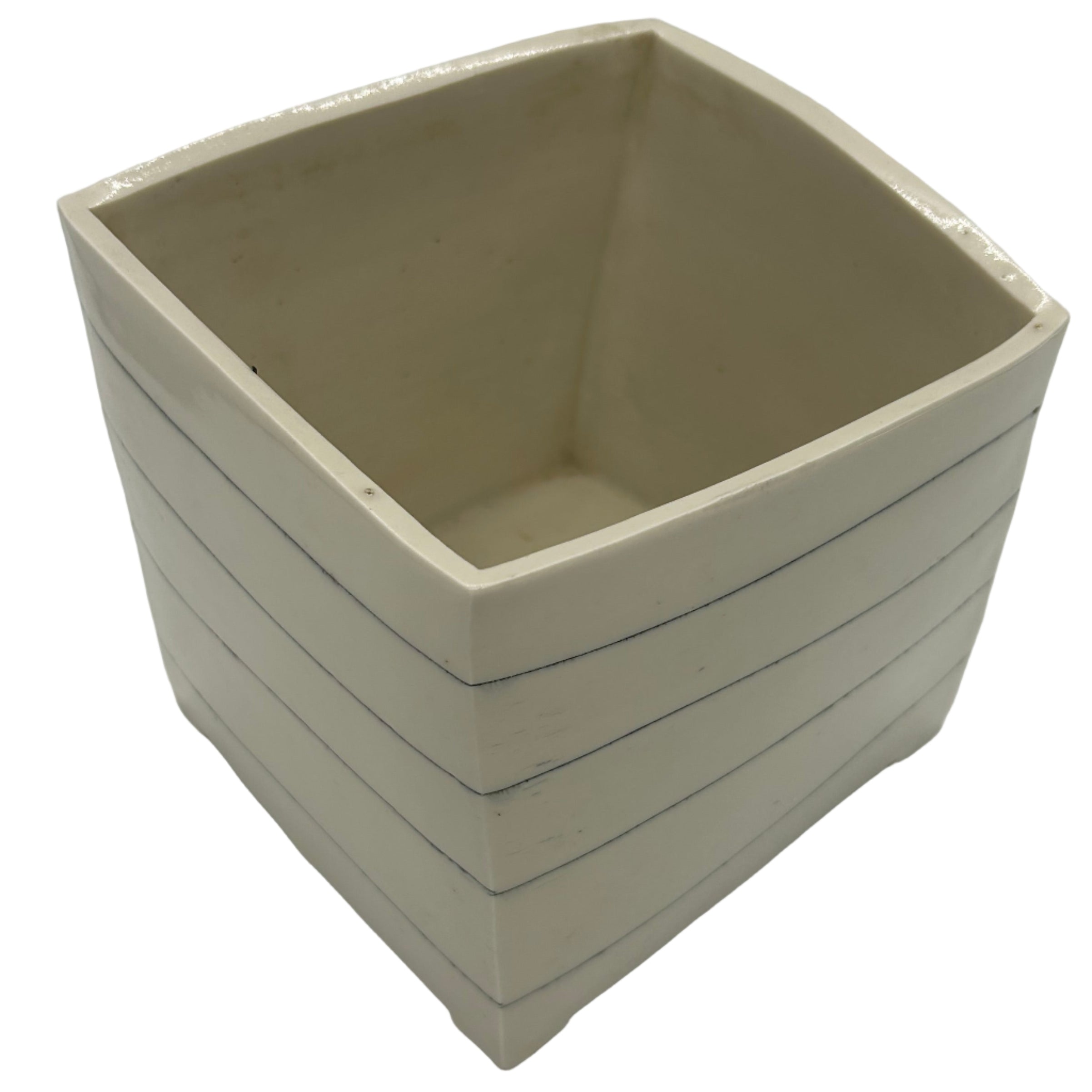 Cleverly distorted porcelain Ikebana container