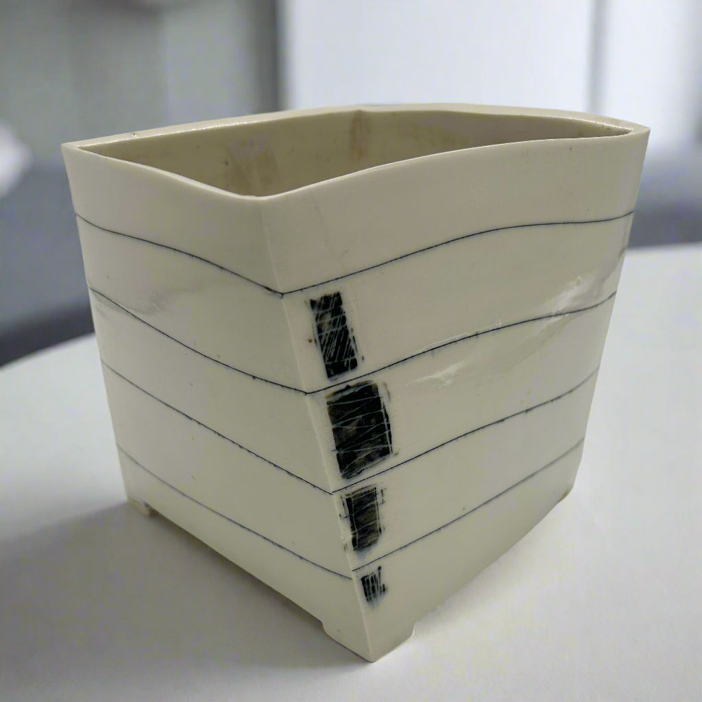 Japanese Ikebana container cleverly distorted by design