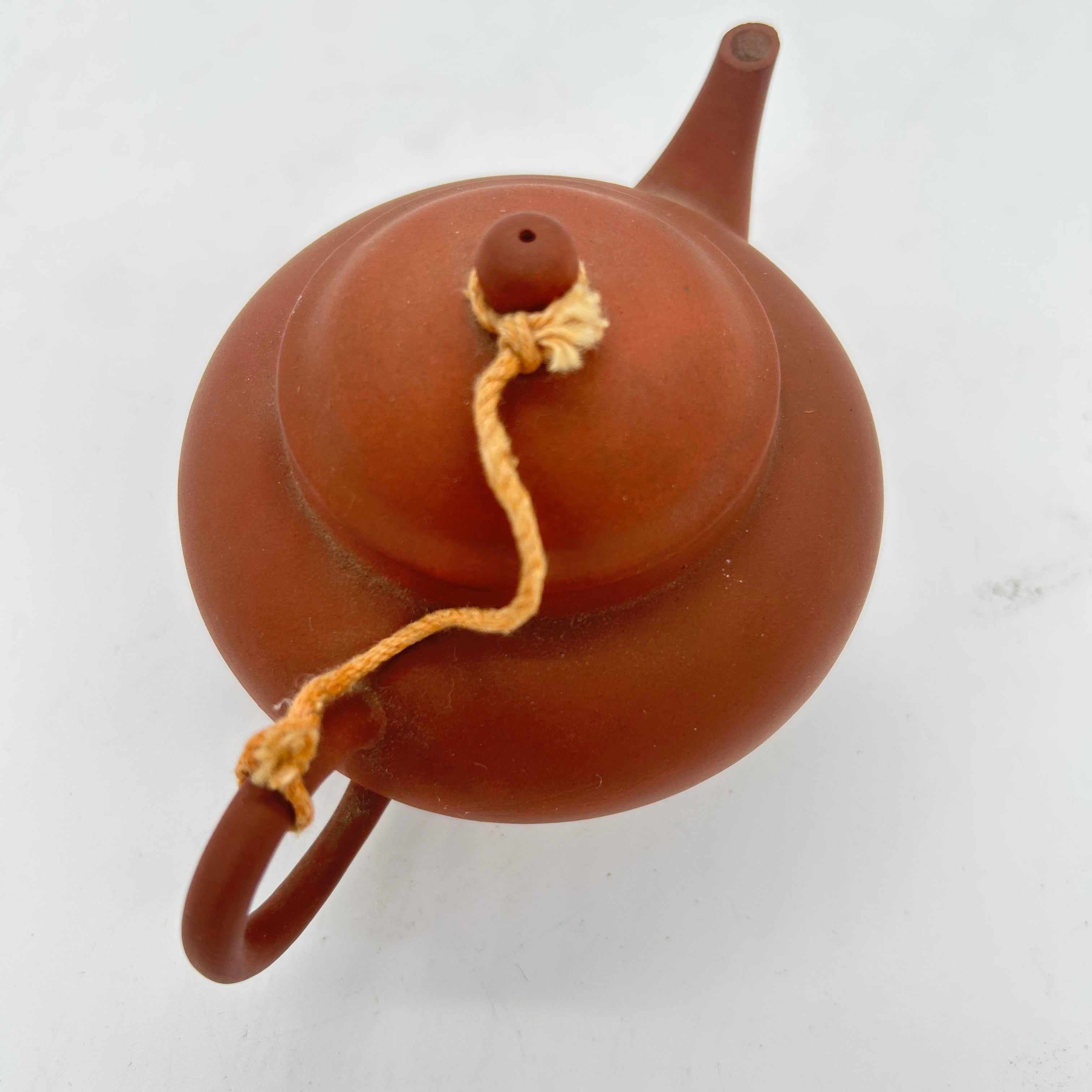 A small Chinese terracotta sen-cha tea pot.
