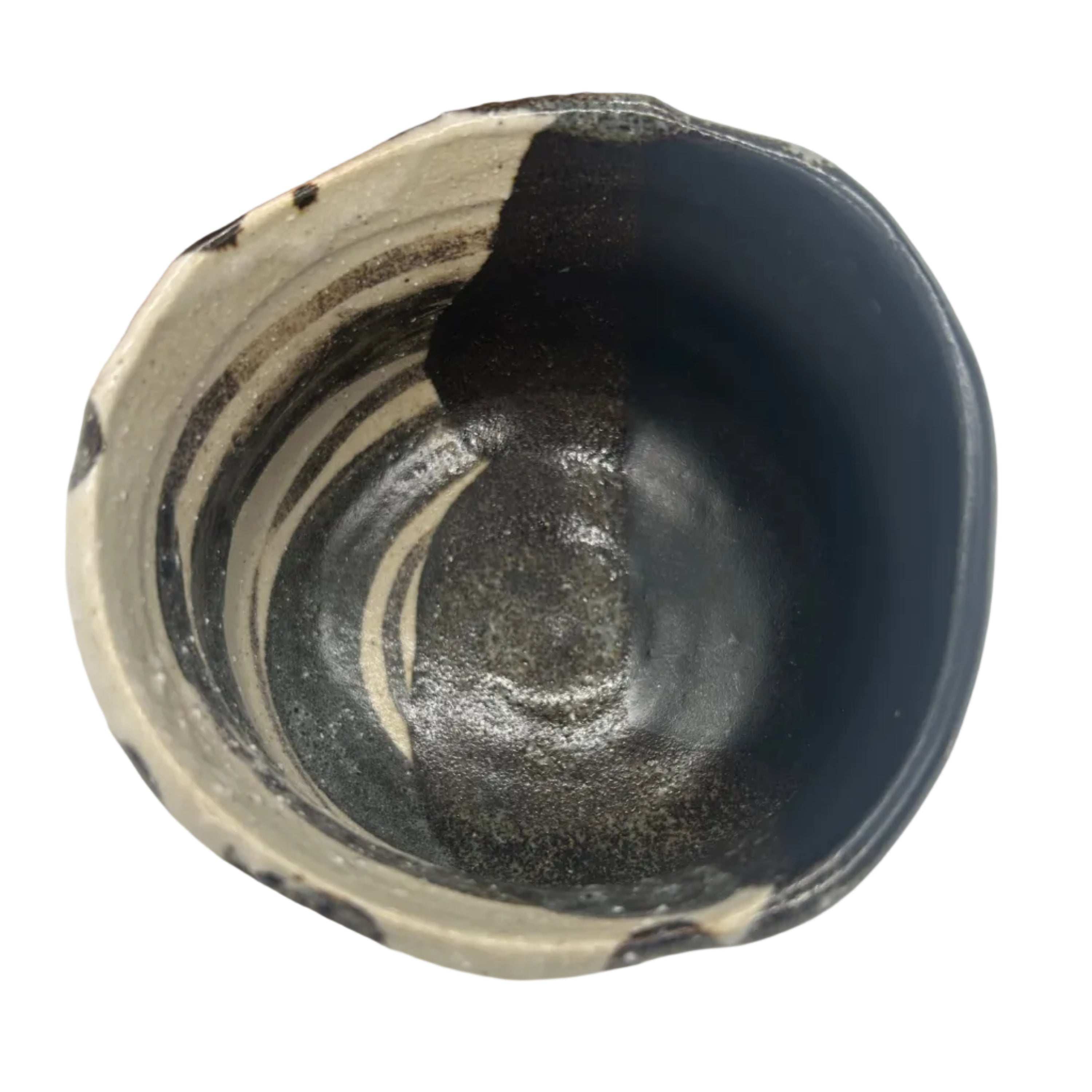 A Japanese Oribe tea bowl (chawan) with an organic feel and a wonderful black glaze. Kazari

This item comes with its original signed box.