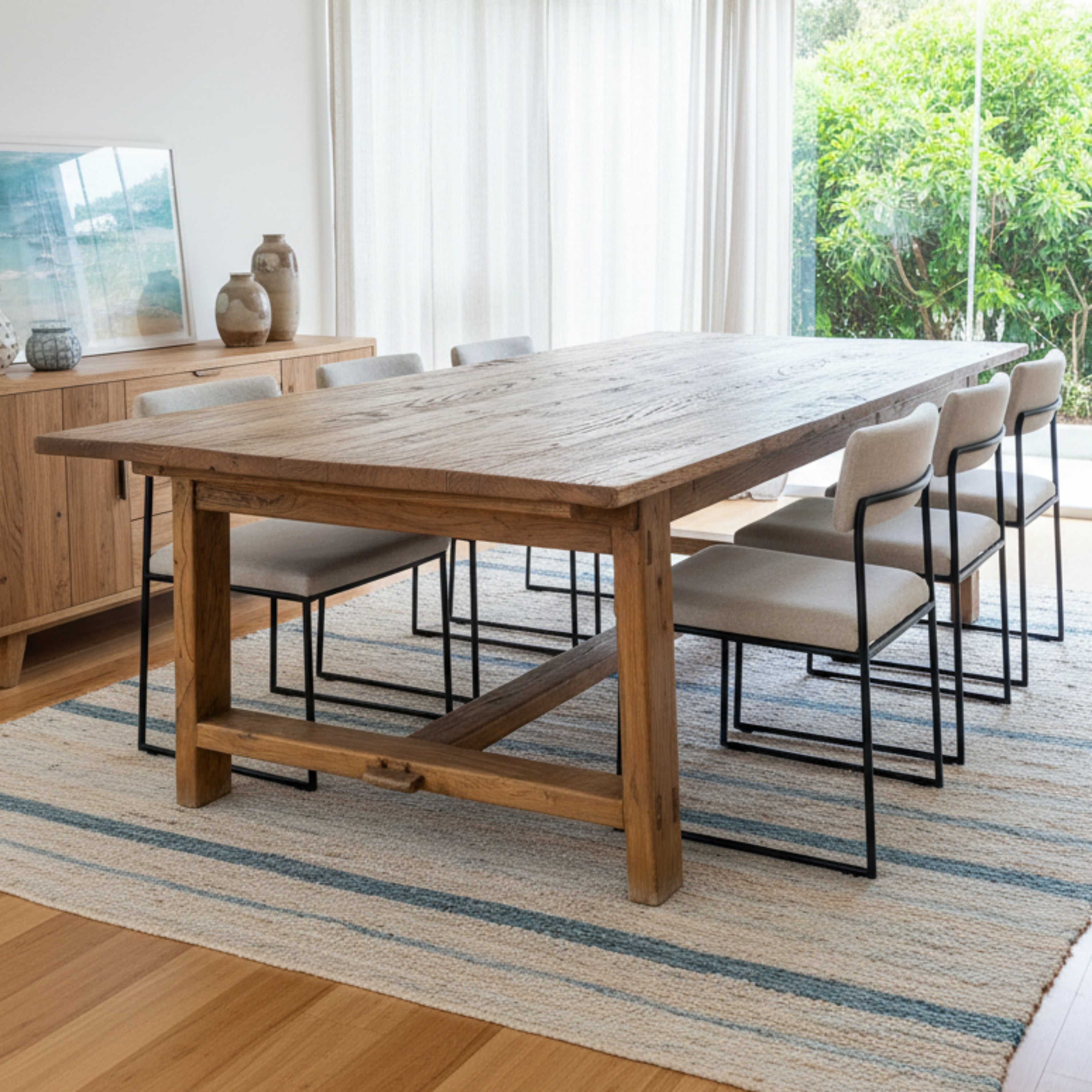 A substantial dining table made from a recycled Chinese Elm door. 18thC.
The table measures approximately 250 cm wide, 120 cm deep, and 79 cm high.