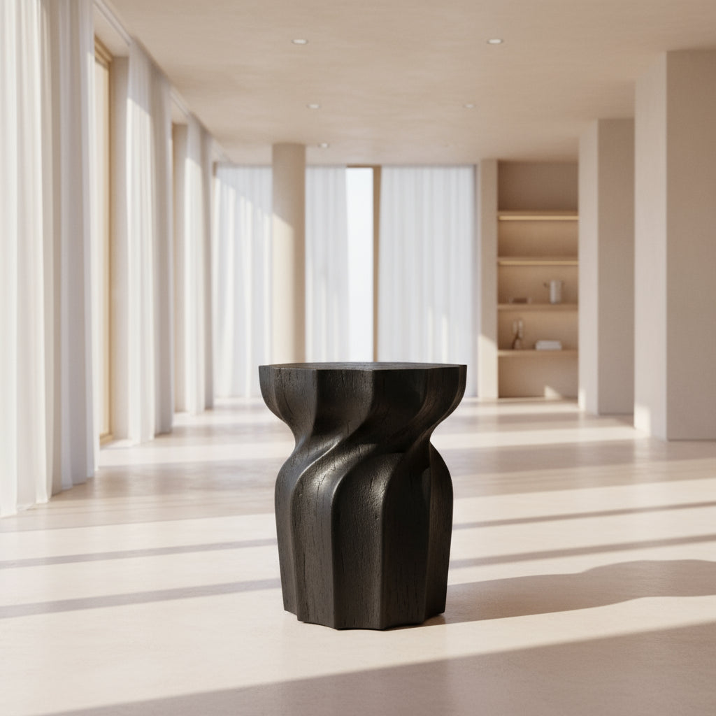 A black ebonized side table