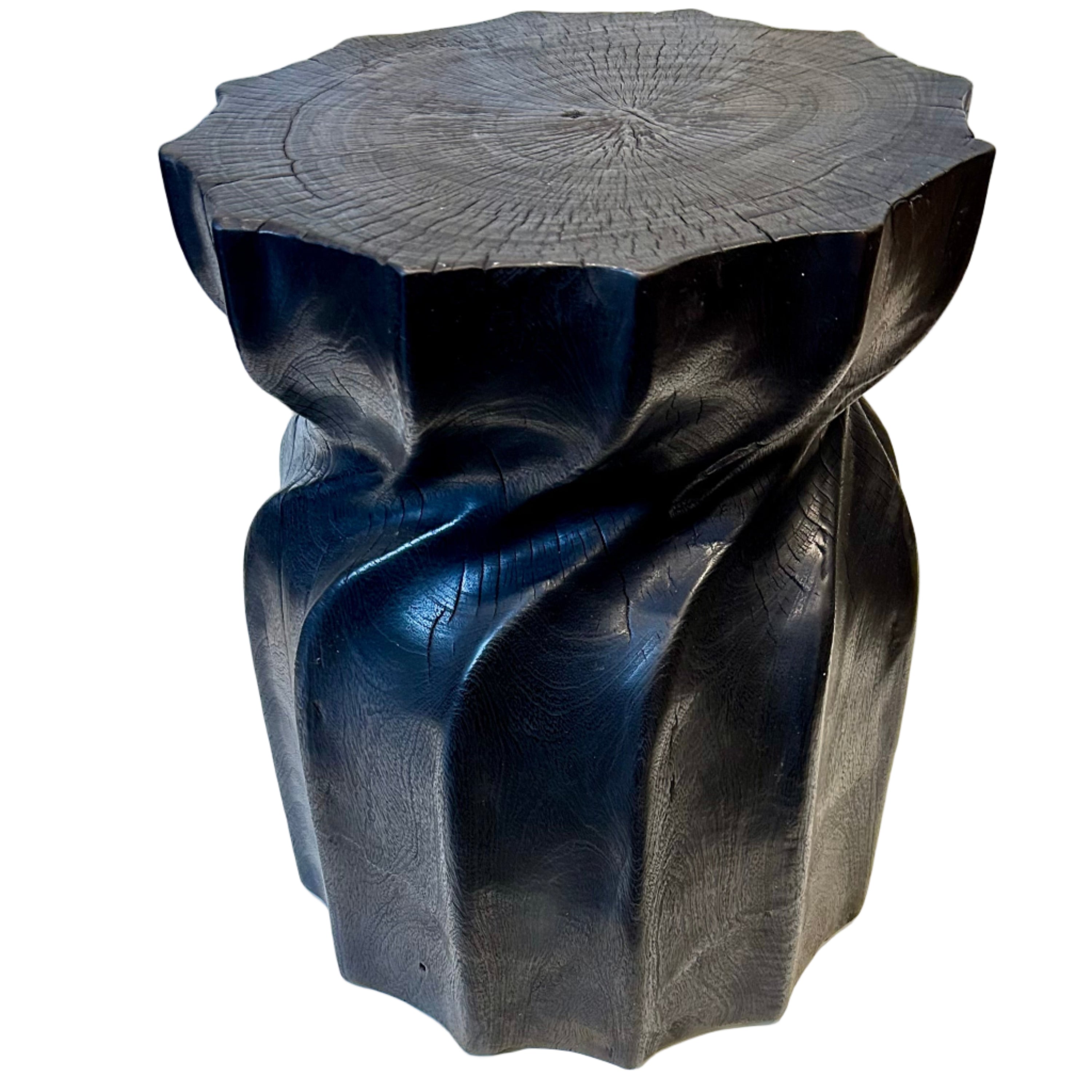 An ebonized side table