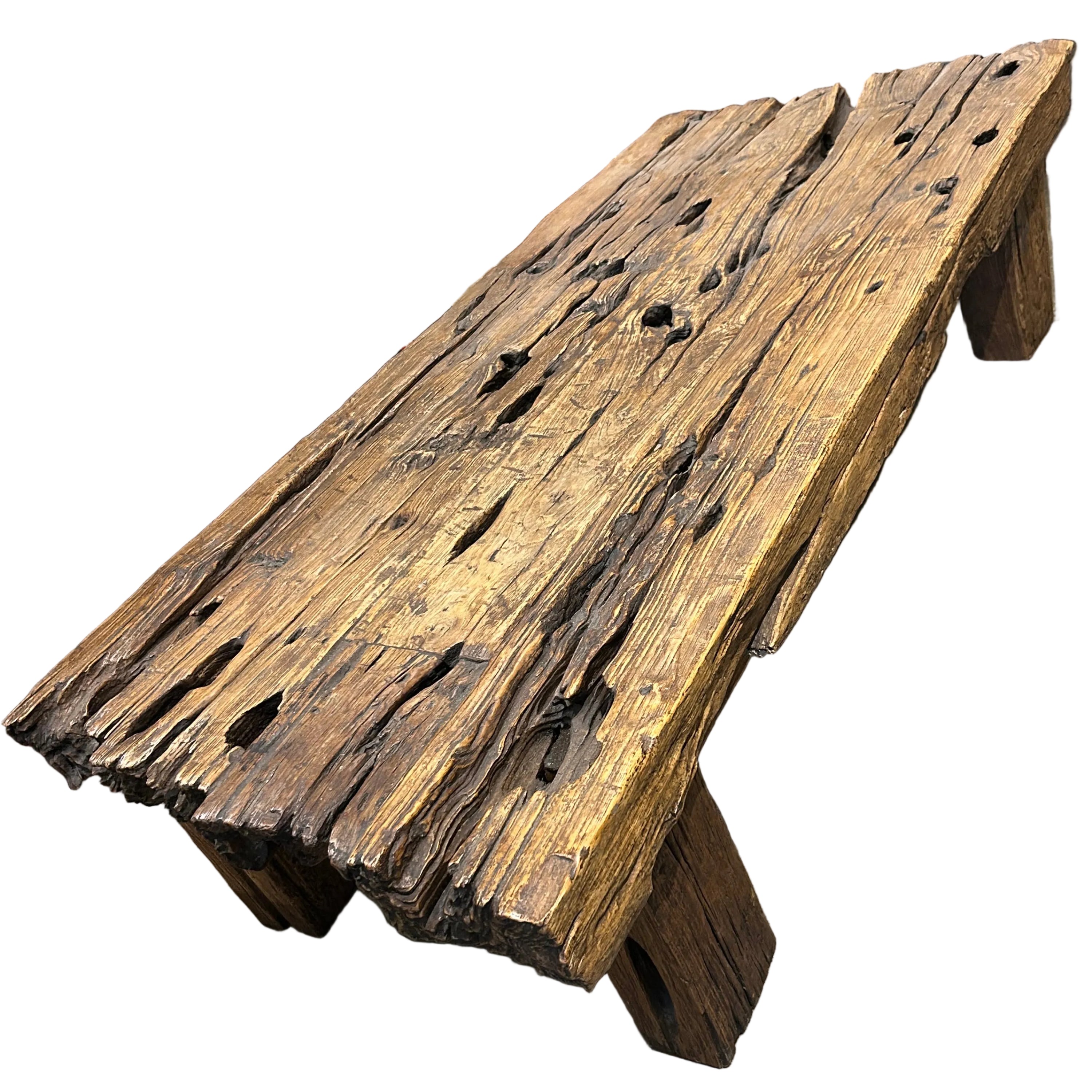 This unique coffee table top is crafted from one solid piece of solid wood. the timber appears to have been taken from an old jetty and shows years of exposure to the elements.