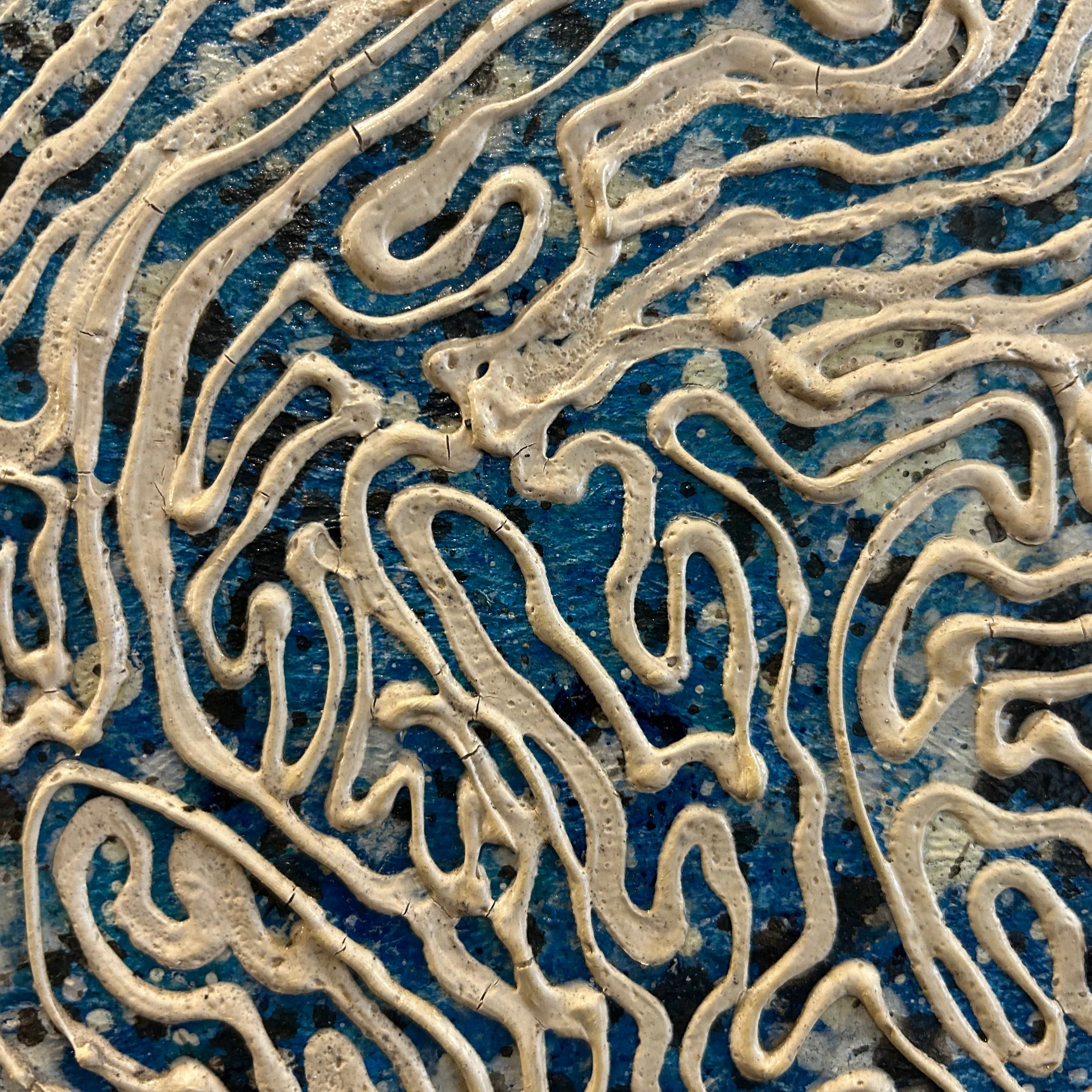 Close-up of a textured surface with wavy patterns in an abstract painting by Gusti Wis