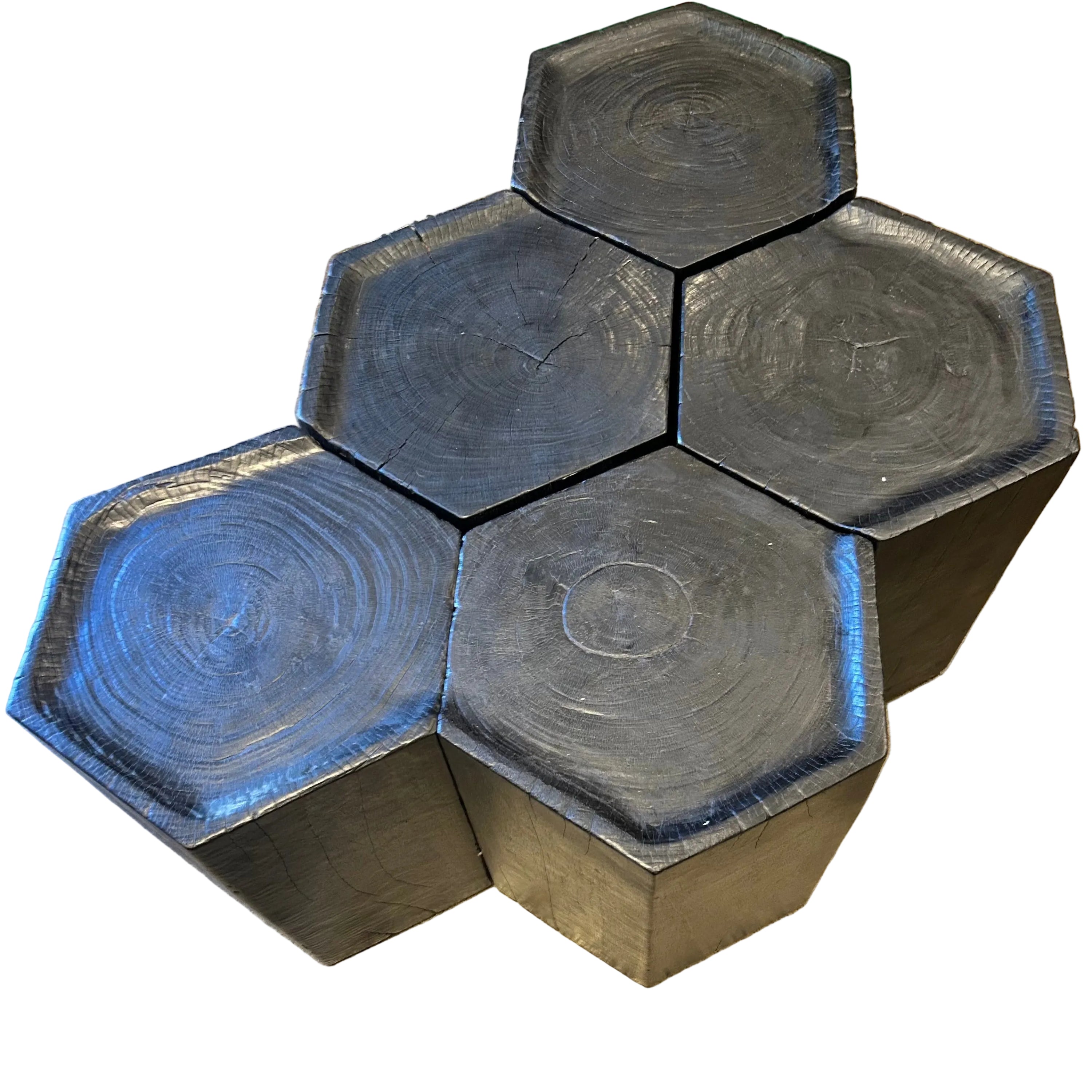 Set of five hexagonal stools in solid ebonized timber. Modular design slots together to form a larger table. Each 35 × 35 × 47 cm. Kazari