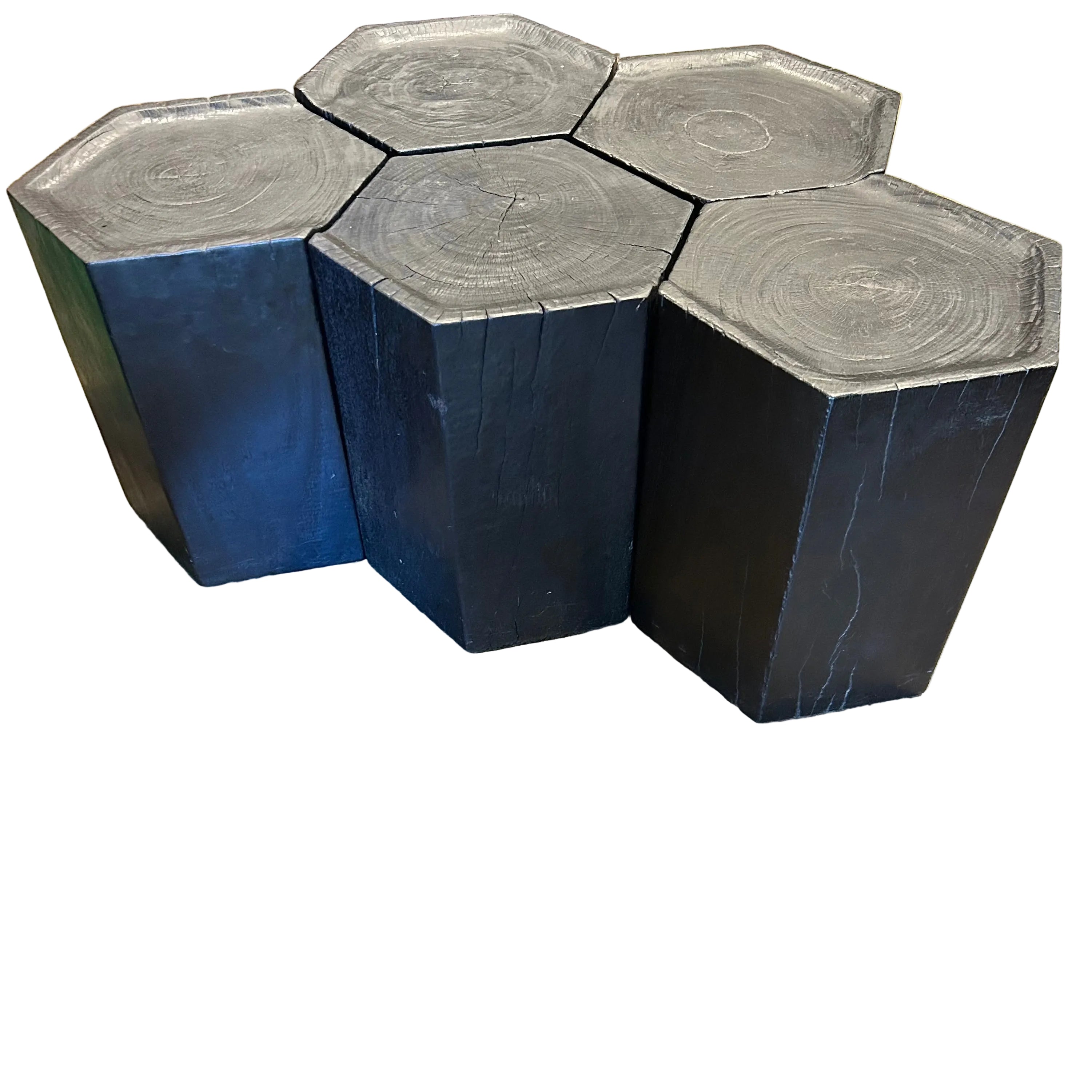 Set of five hexagonal stools in solid ebonized timber. Modular design slots together to form a larger table. Each 35 × 35 × 47 cm. Kazari