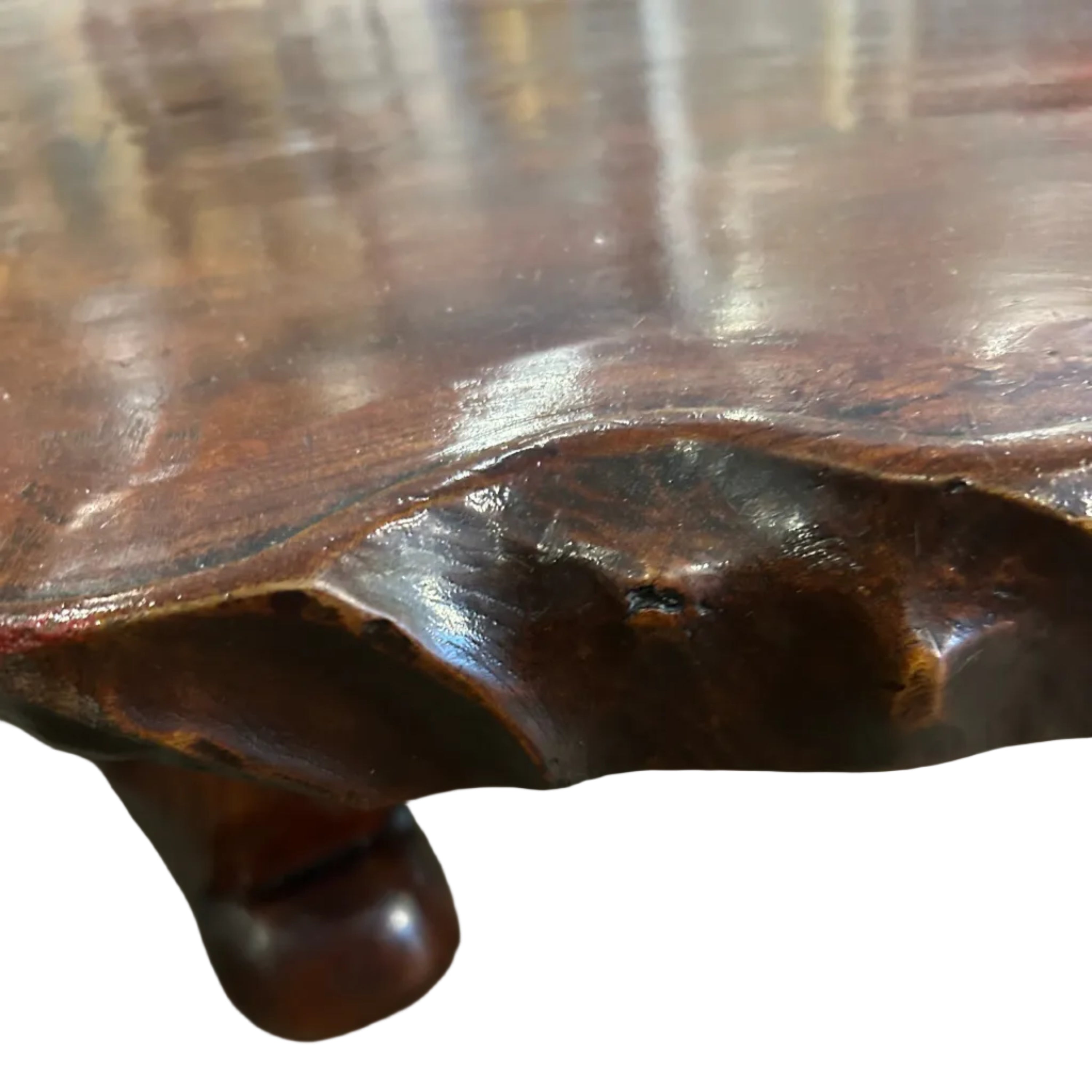 A Japanese coffee table made of one solid slab of zelcova wood.