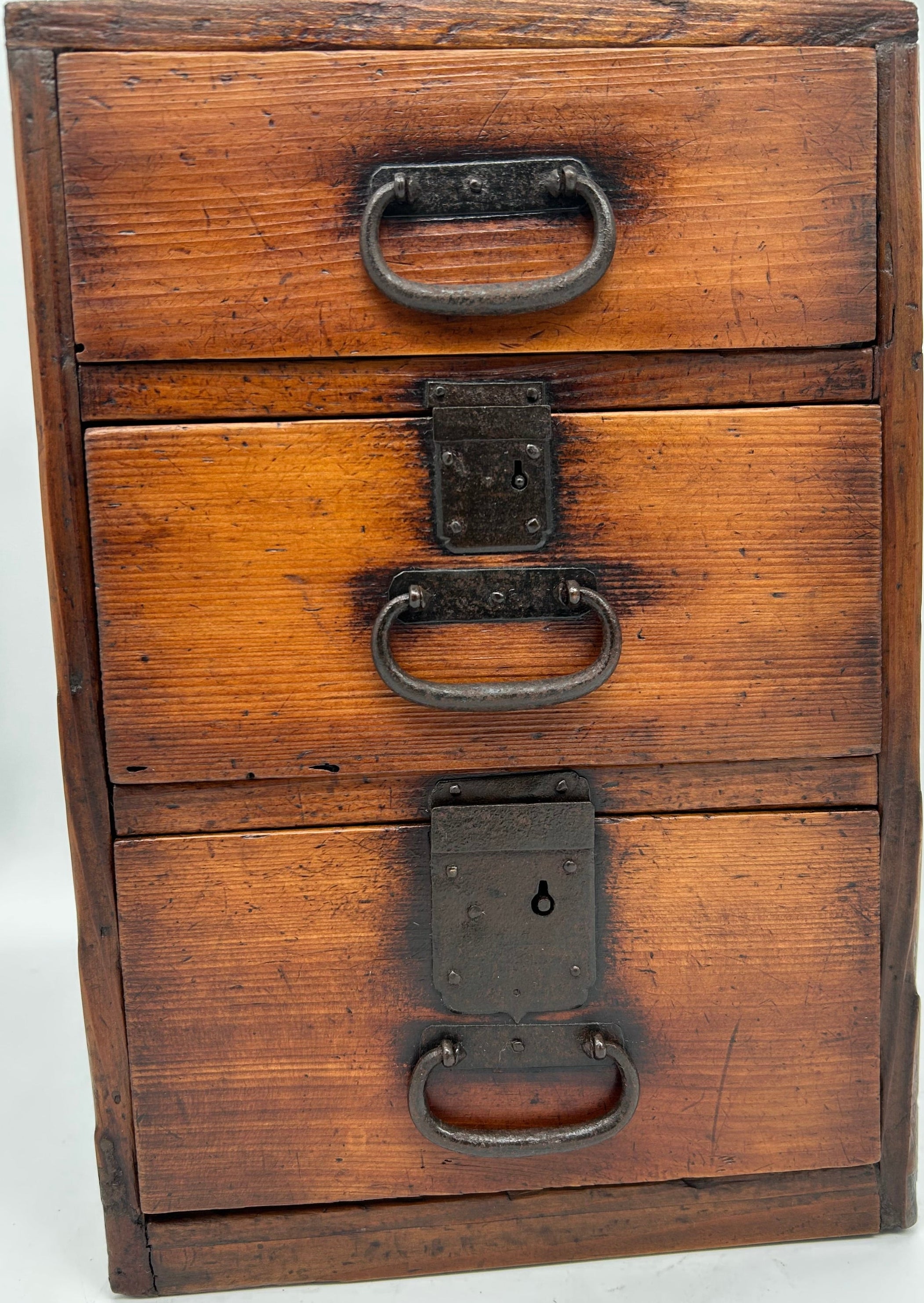 A small storage chest made of cypress wood and iron hardware used for writing implements. MEIJI period - late 19thC. We have several other similar chests instore.