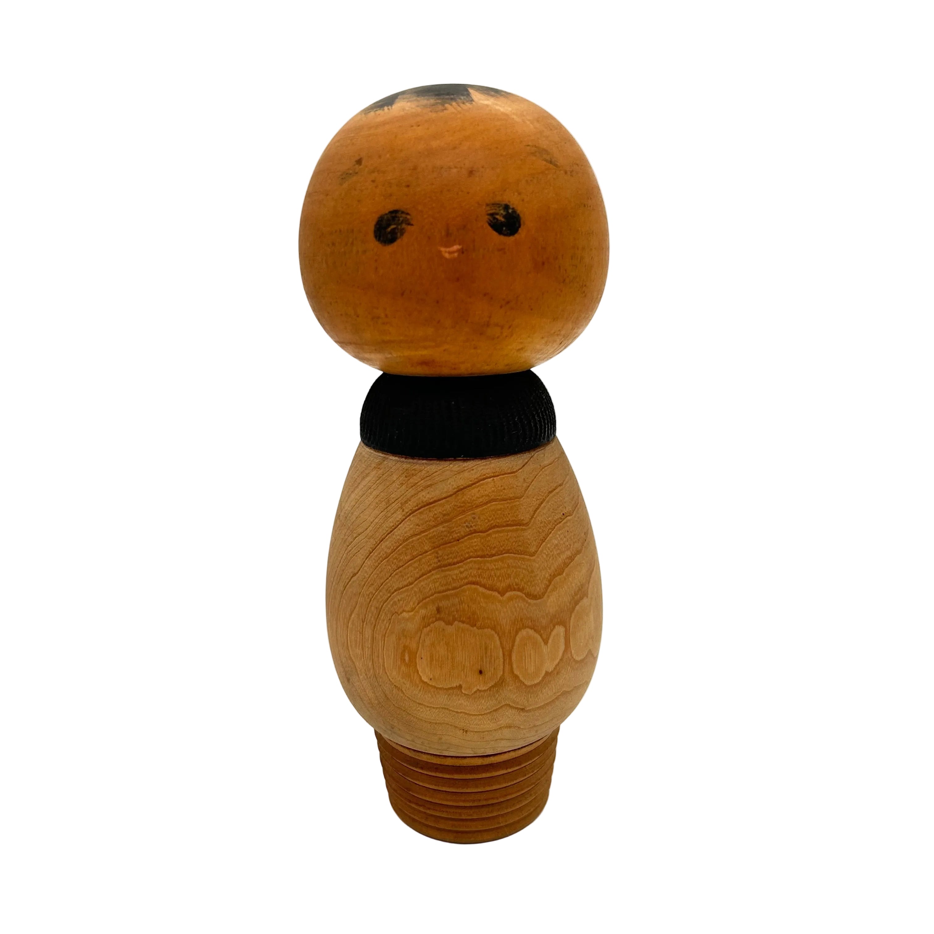 A vintage Japanese creative Kokeshi doll. A very appealing face and body with a light bulb base.