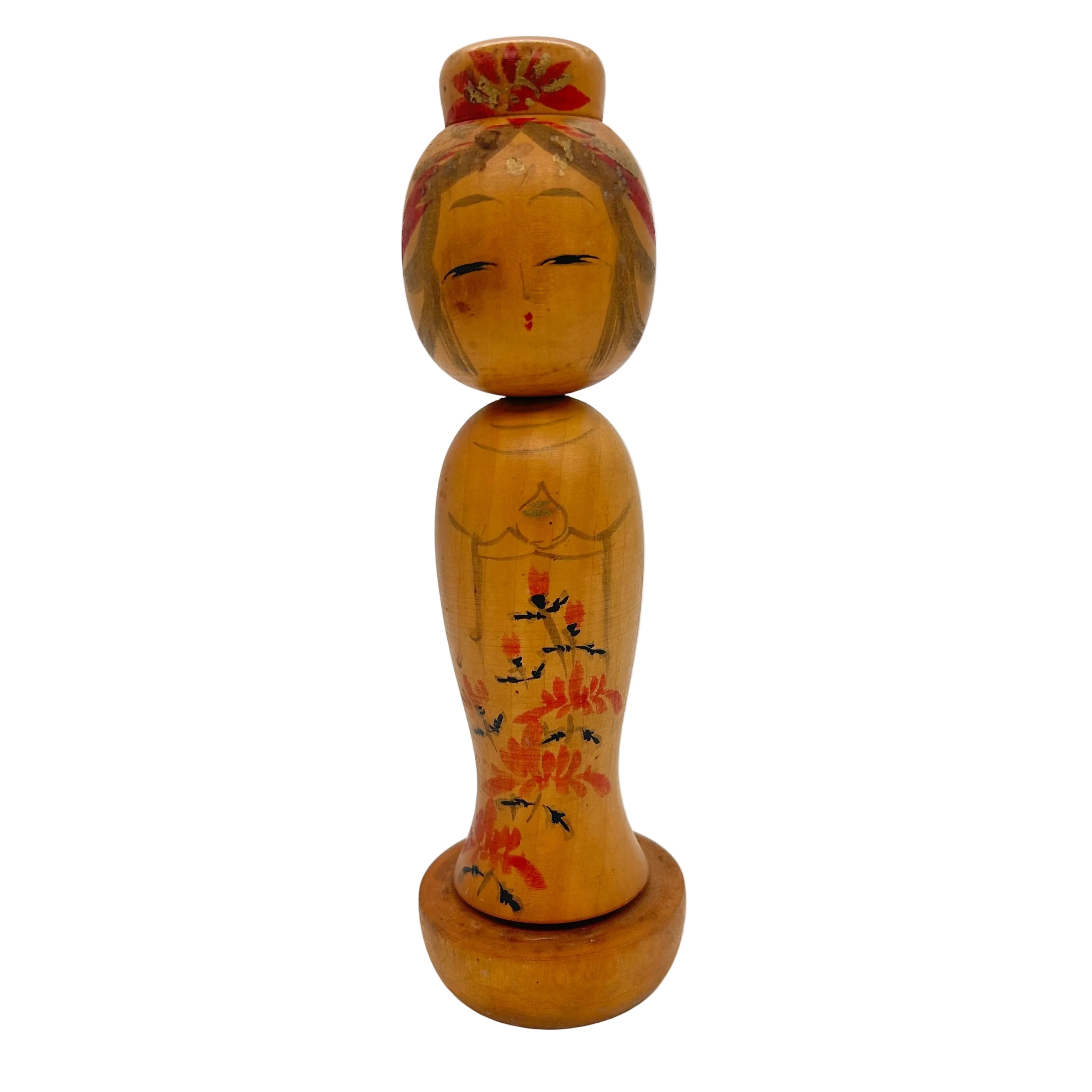 A vintage Japanese creative Kokeshi doll. A very ladylike appearance.
