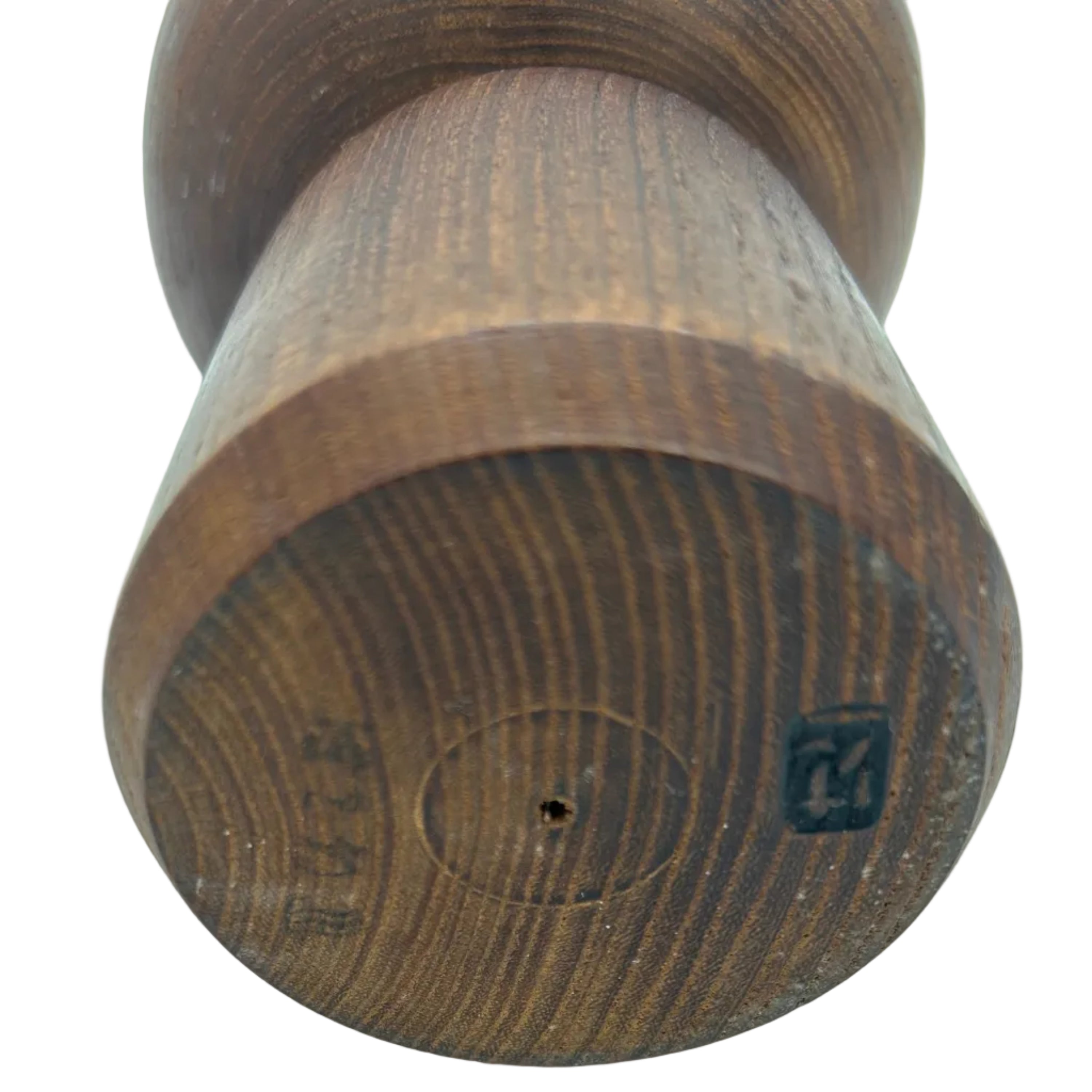 A vintage traditional Japanese kokeshi from the 1960's. She is an individual - dark, short and subtly decorated.