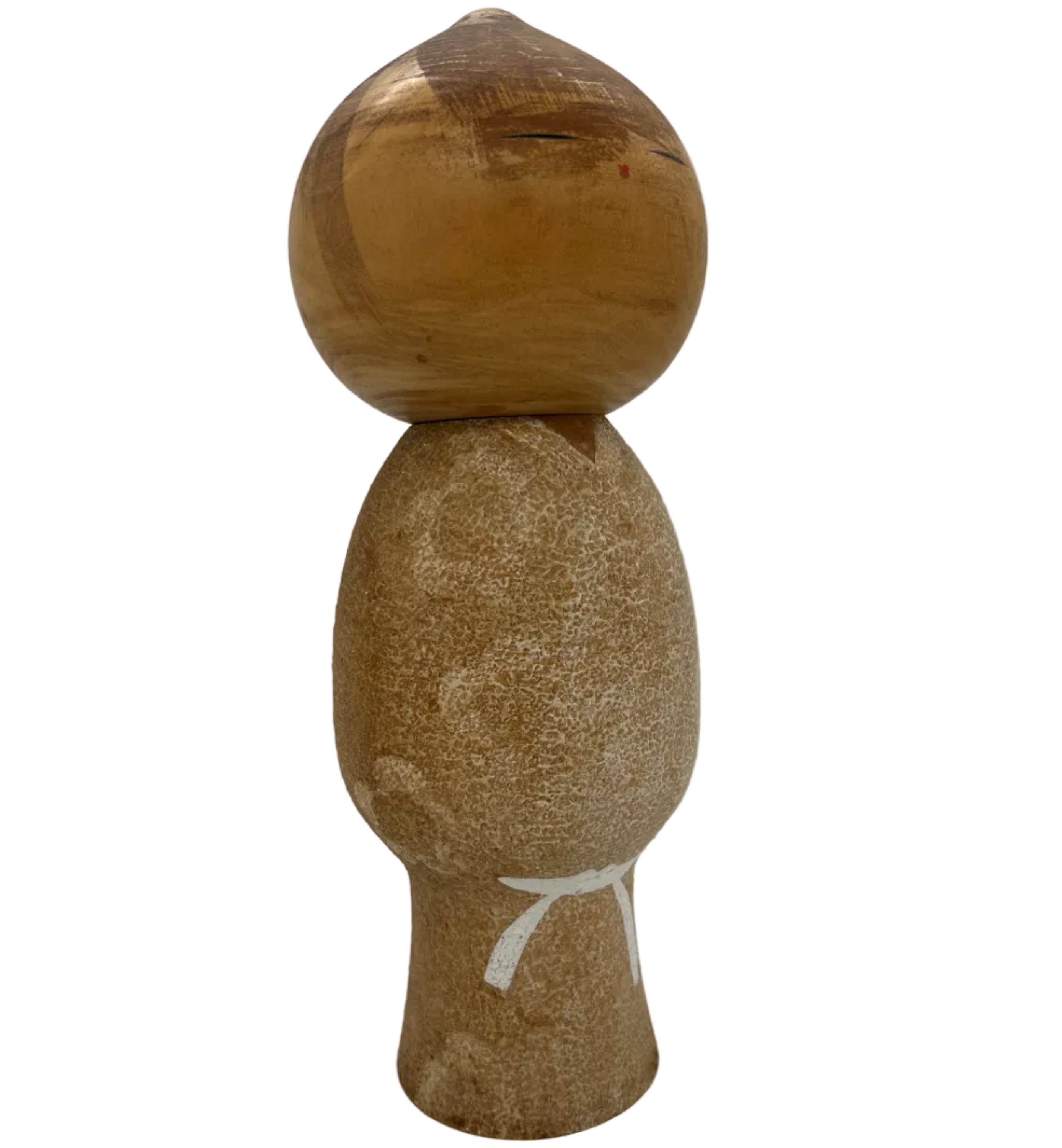 A vintage Japanese kokeshi made by Watanabe Masao Stylish and distinctive.
