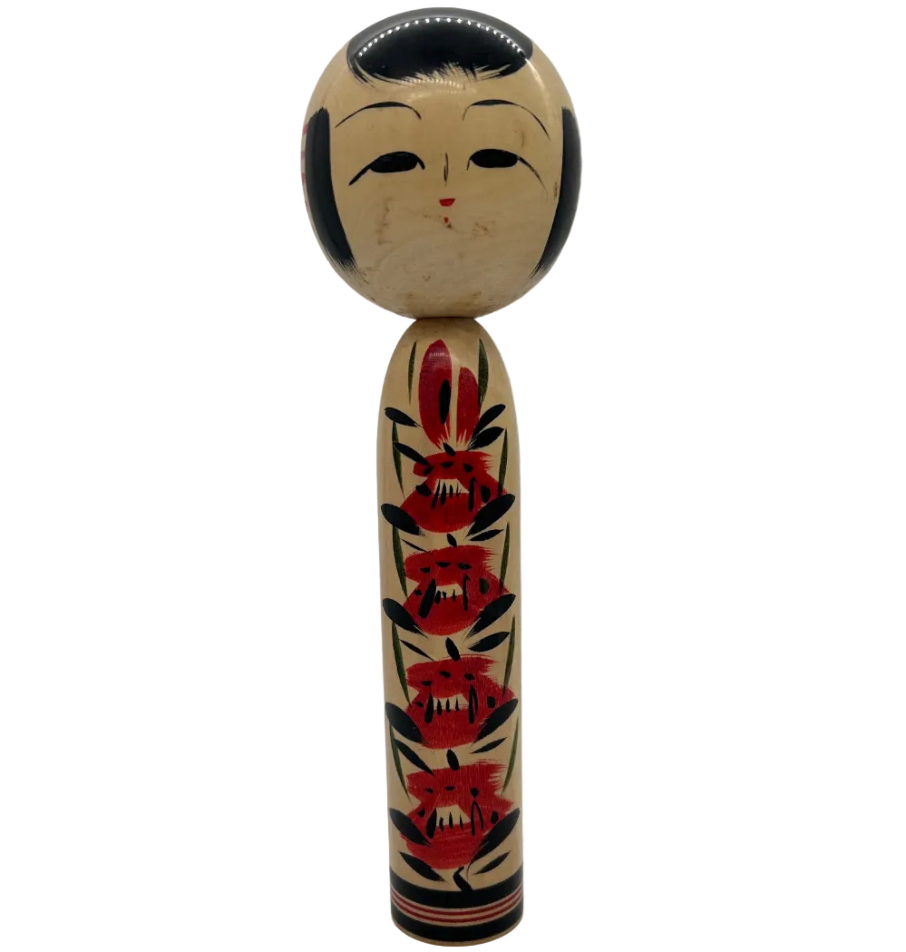 A vintage traditional Japanese Togatta kokeshi from Miyagi prefecture. She has an individual pattern on her torso. Signed on the base.