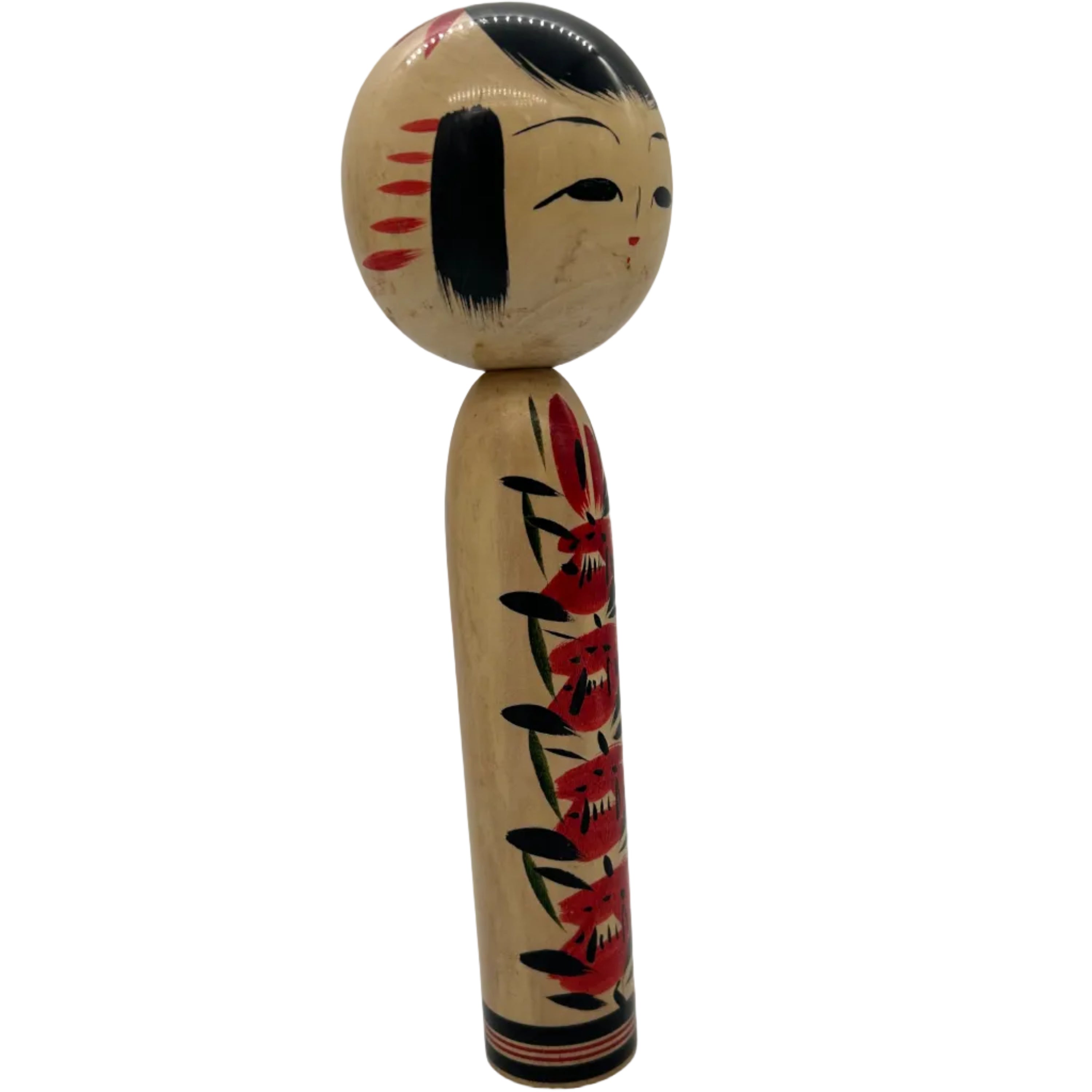 A vintage traditional Japanese Togatta kokeshi from Miyagi prefecture. She has an individual pattern on her torso. Signed on the base.