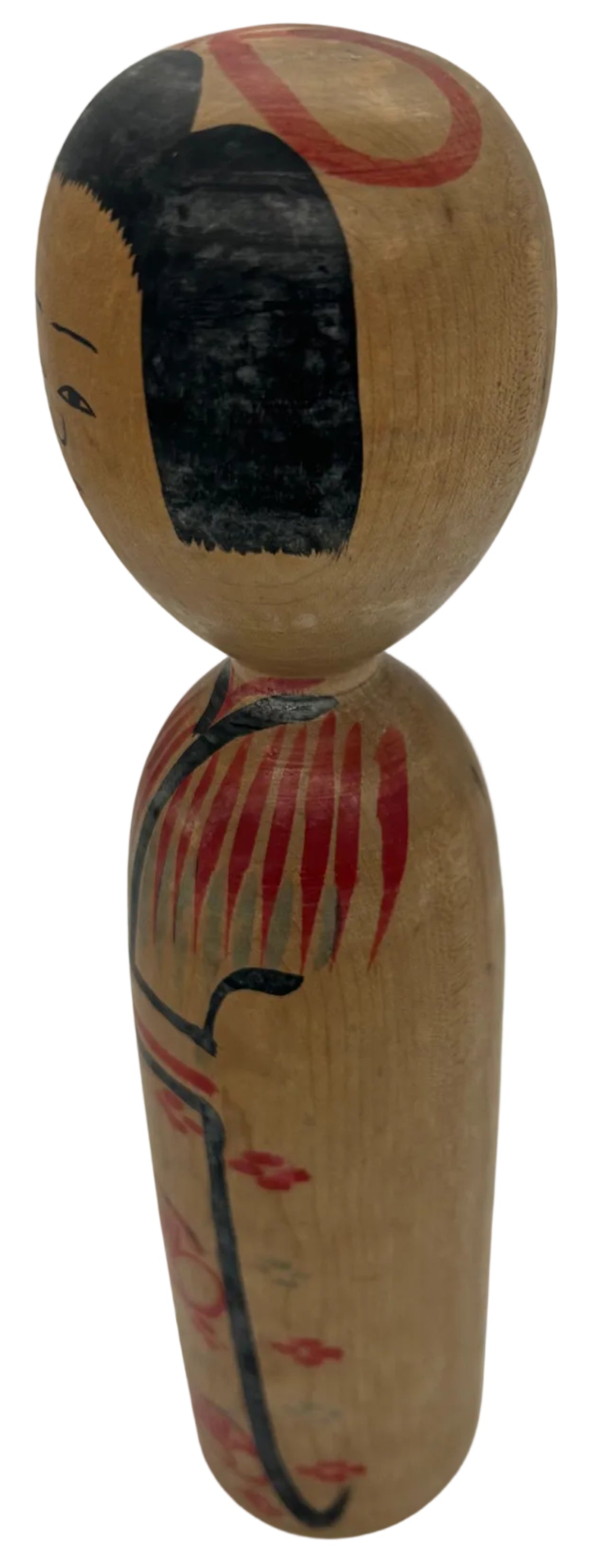 A vintage Japanese kokeshi made by Kyutaro Ogura - an artist rated as a "Living National Treasure".