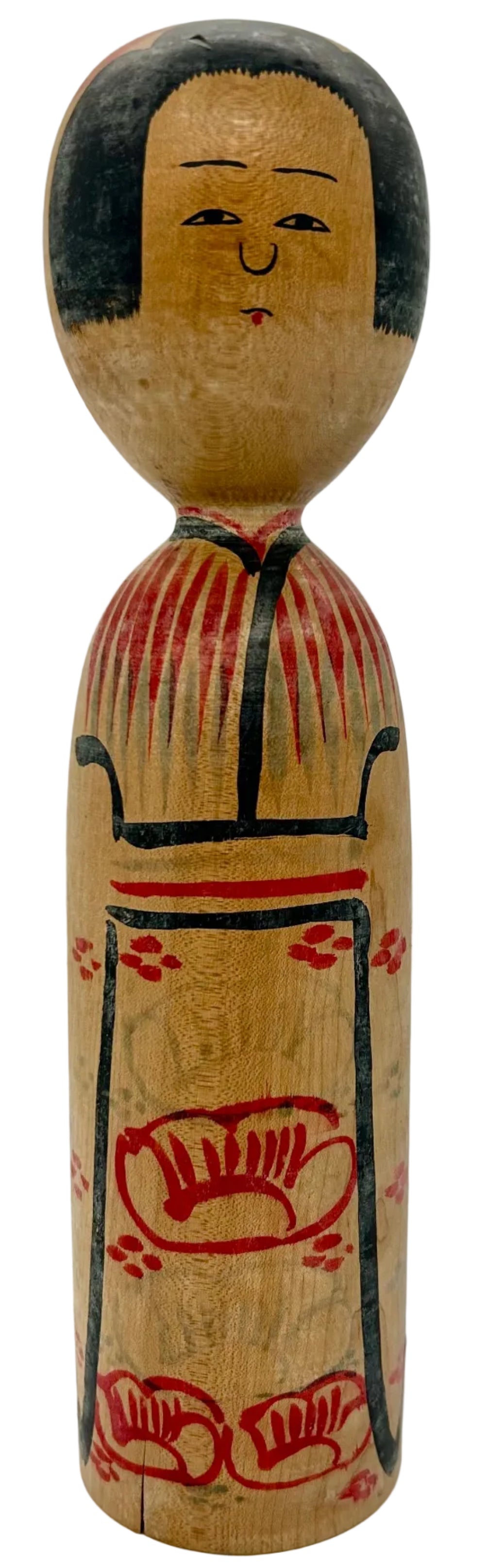 A vintage Japanese kokeshi made by Kyutaro Ogura - an artist rated as a "Living National Treasure".