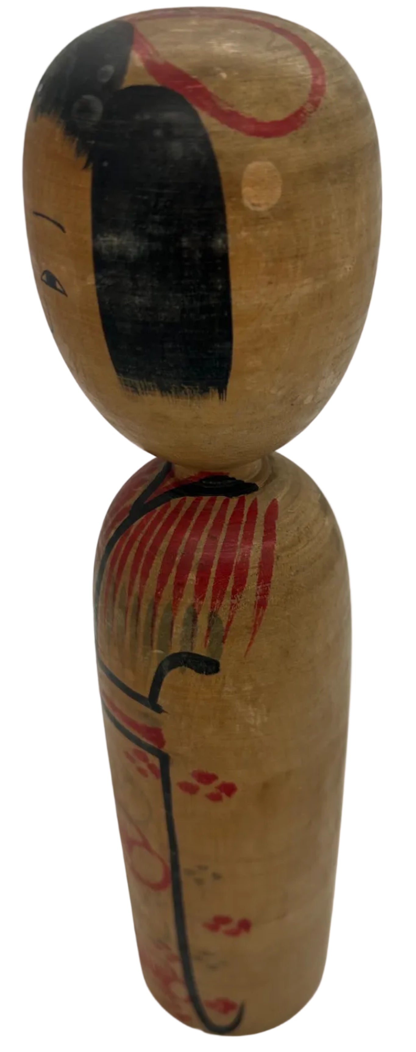 A vintage Japanese kokeshi made by Kyutaro Ogura - an artist rated as a "Living National Treasure".