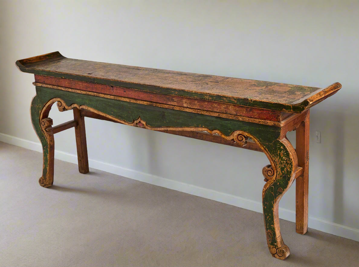 This substantial Chinese Buddhist altar table from Gansu province dates back to the early 19th century. Its aged patina and sturdy construction make it a rare, tranquil addition to any home, perfect for creating a beautiful atmosphere.