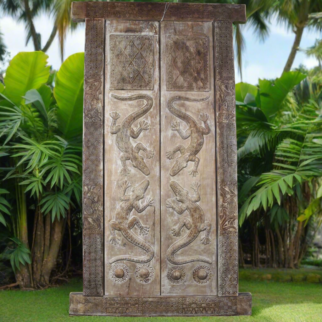 Kazari a  pair of unique and oversized tribal doors and frame from Timor with crocodile motifs