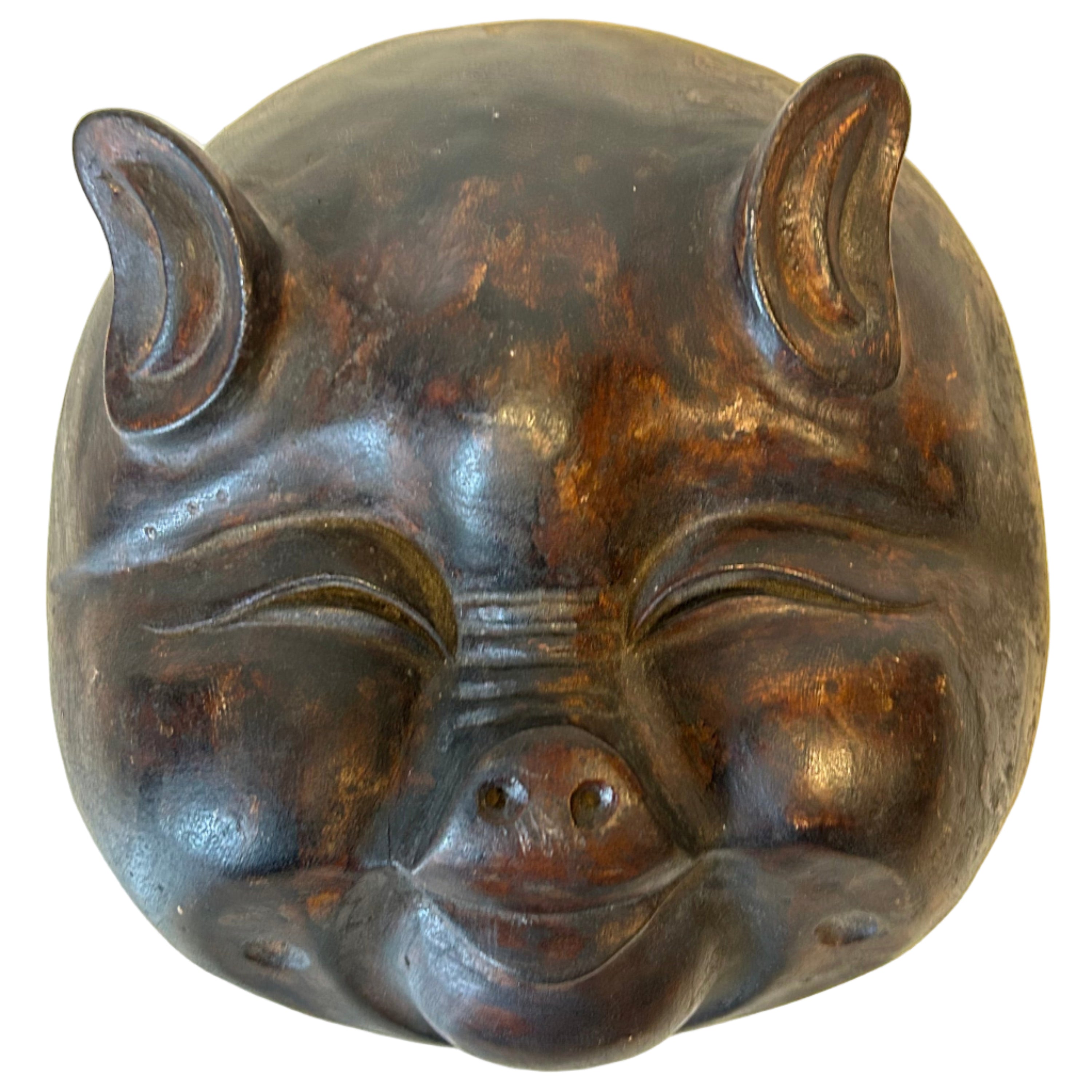 Hand carved, wooden pig mask from Indonesia