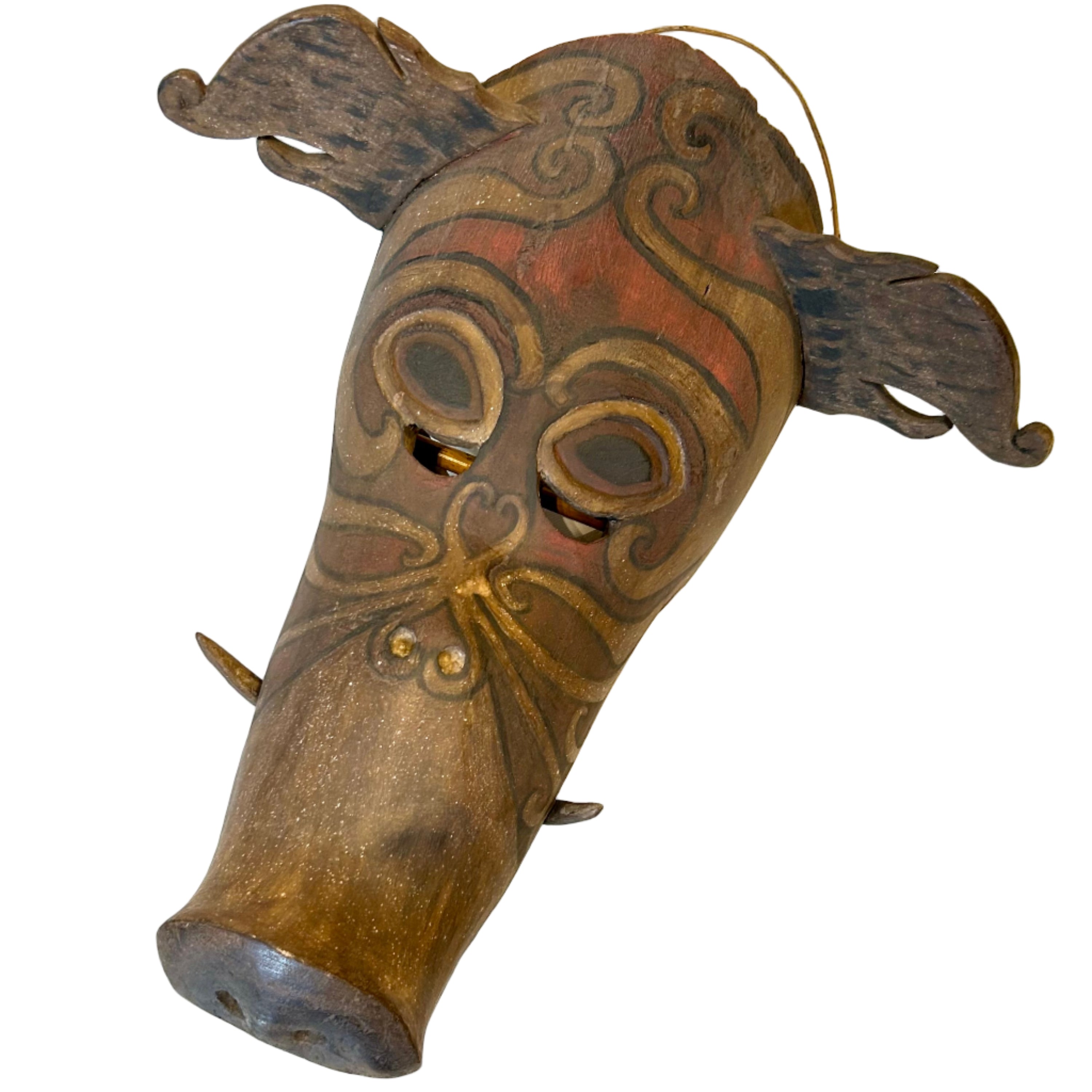 Wooden mask with decorative patterns from Borneo