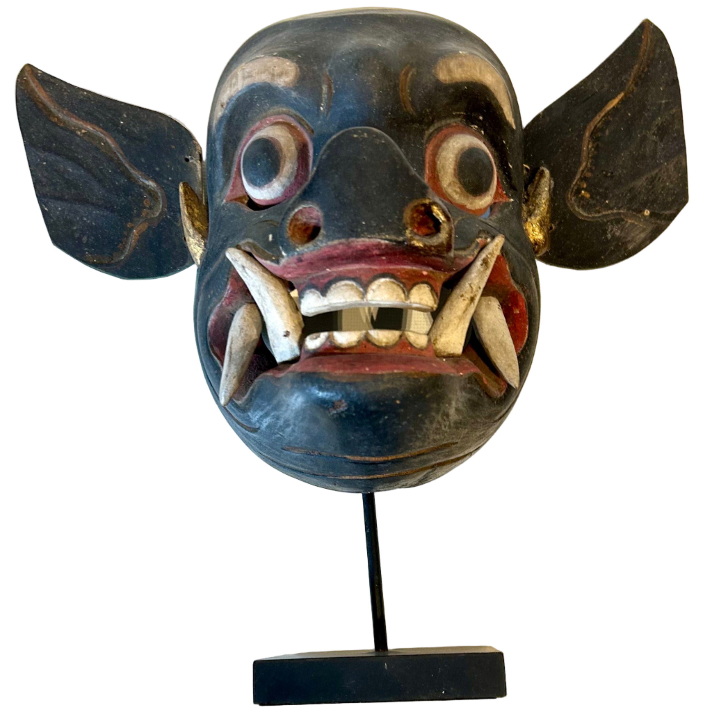 Traditional mask on a stand from Indonesia