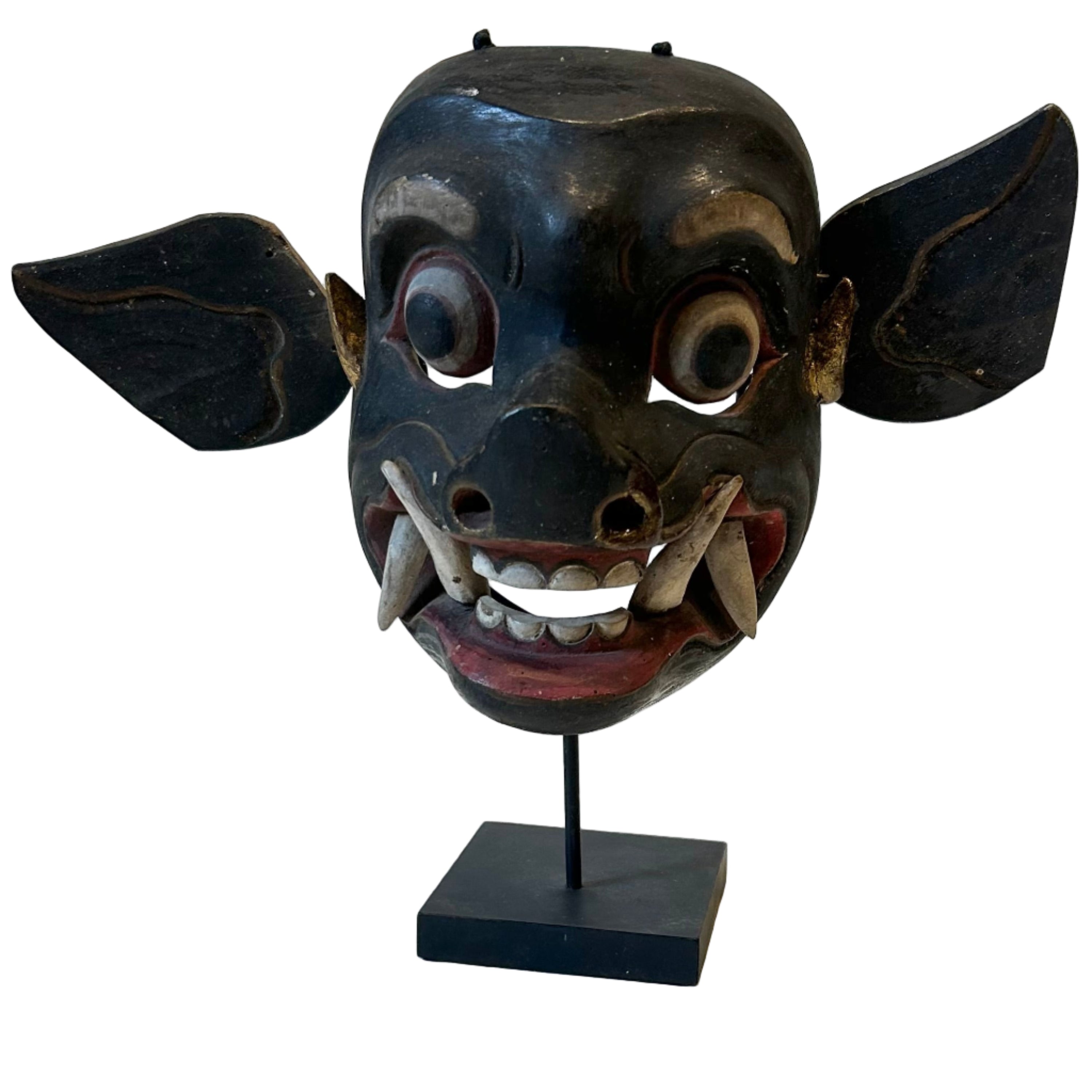 Antique pig mask from Indonesia