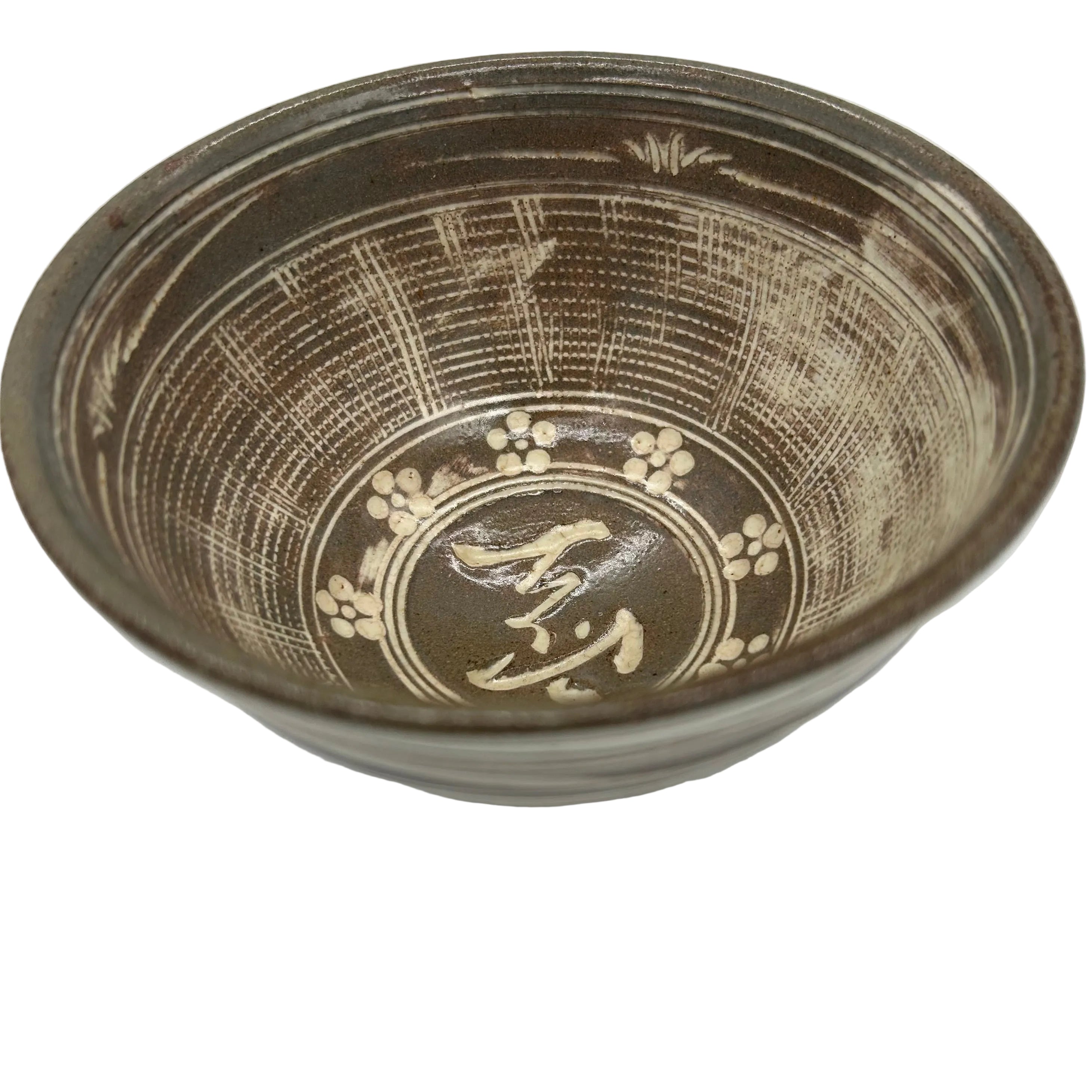 A Japanese pottery tea bowl with beautiful internal decoration and a wonderful swirling glaze on the outside.
