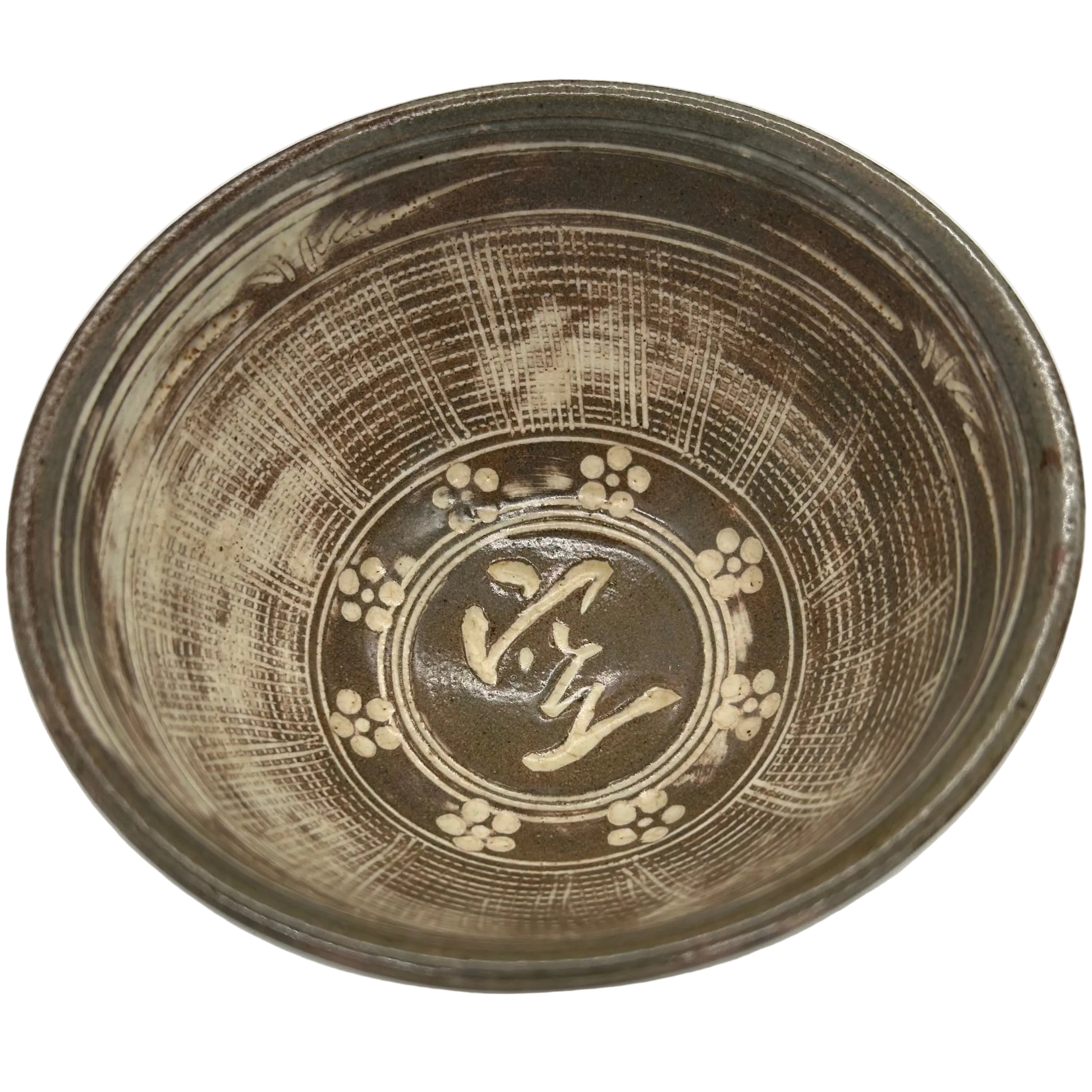 A Japanese pottery tea bowl with beautiful internal decoration and a wonderful swirling glaze on the outside.