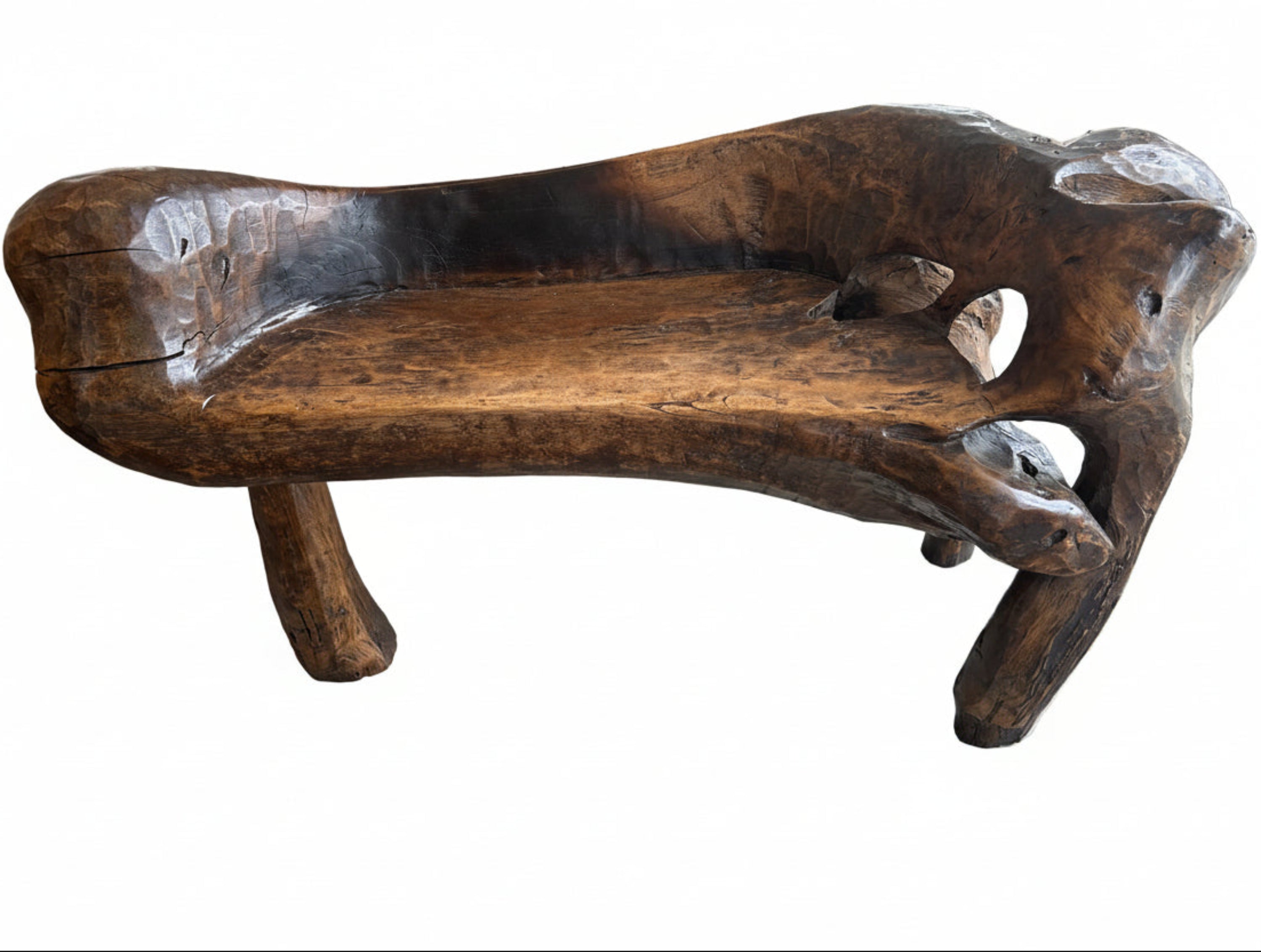 A rustic natural timber seat in the folk art style. 