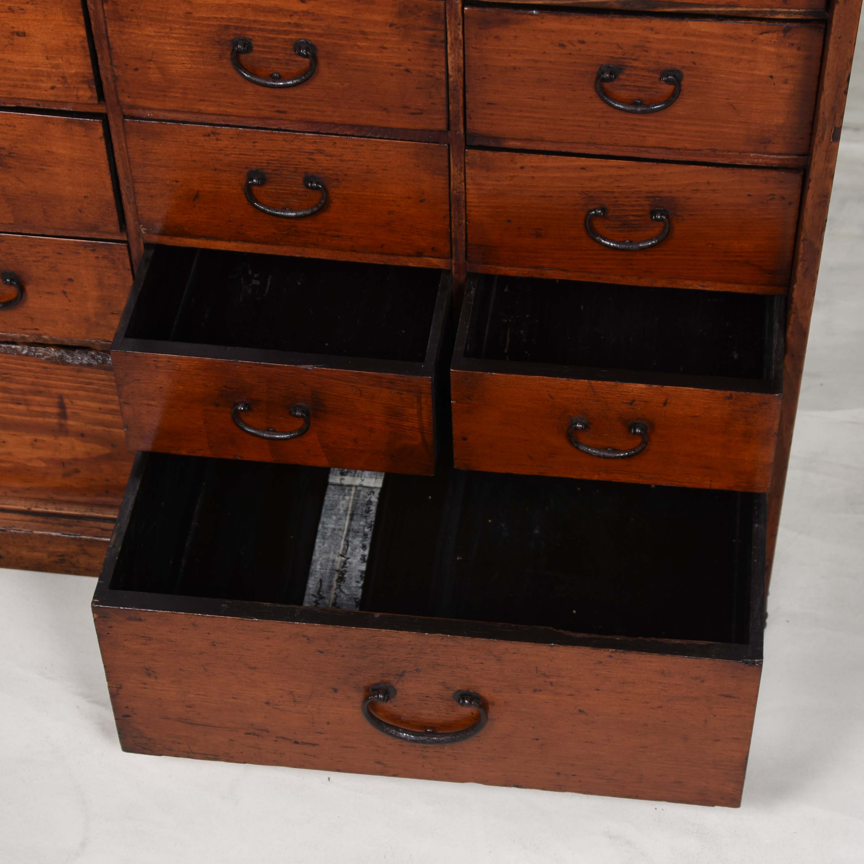 Kazari Japanese cedar 18 drawer merchant's shop storage chest - choba dansu. Meiji period, late 19th century.