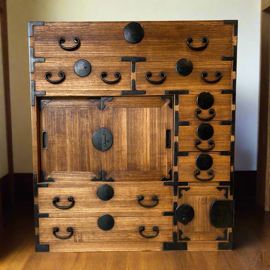 A handsome Japanese shop storage chest (choba-dansu). Made from paulownia wood with iron hardware. MEIJI period early 20thC.