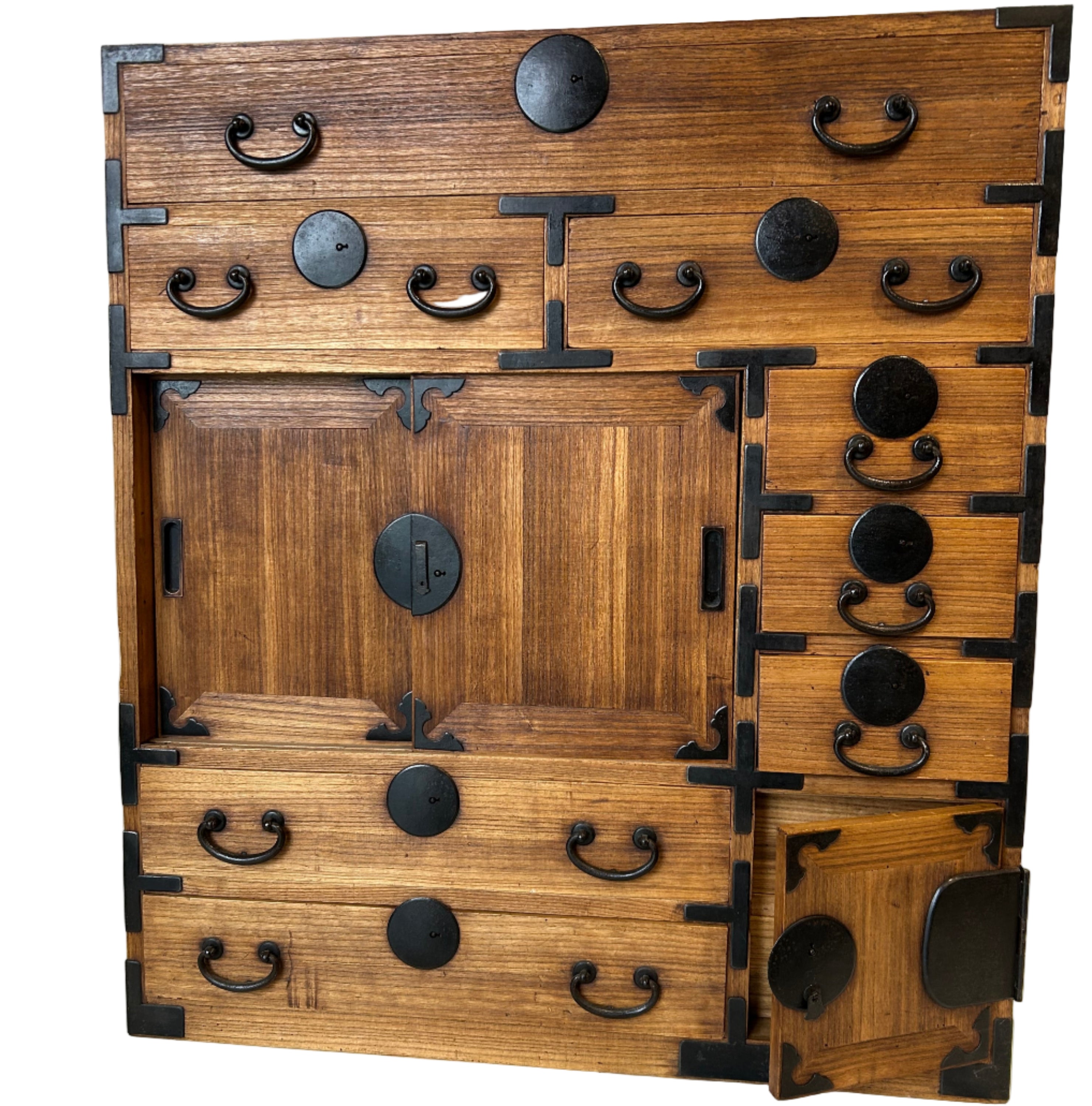 A handsome Japanese shop storage chest (choba-dansu). Made from paulownia wood with iron hardware. MEIJI period early 20thC.