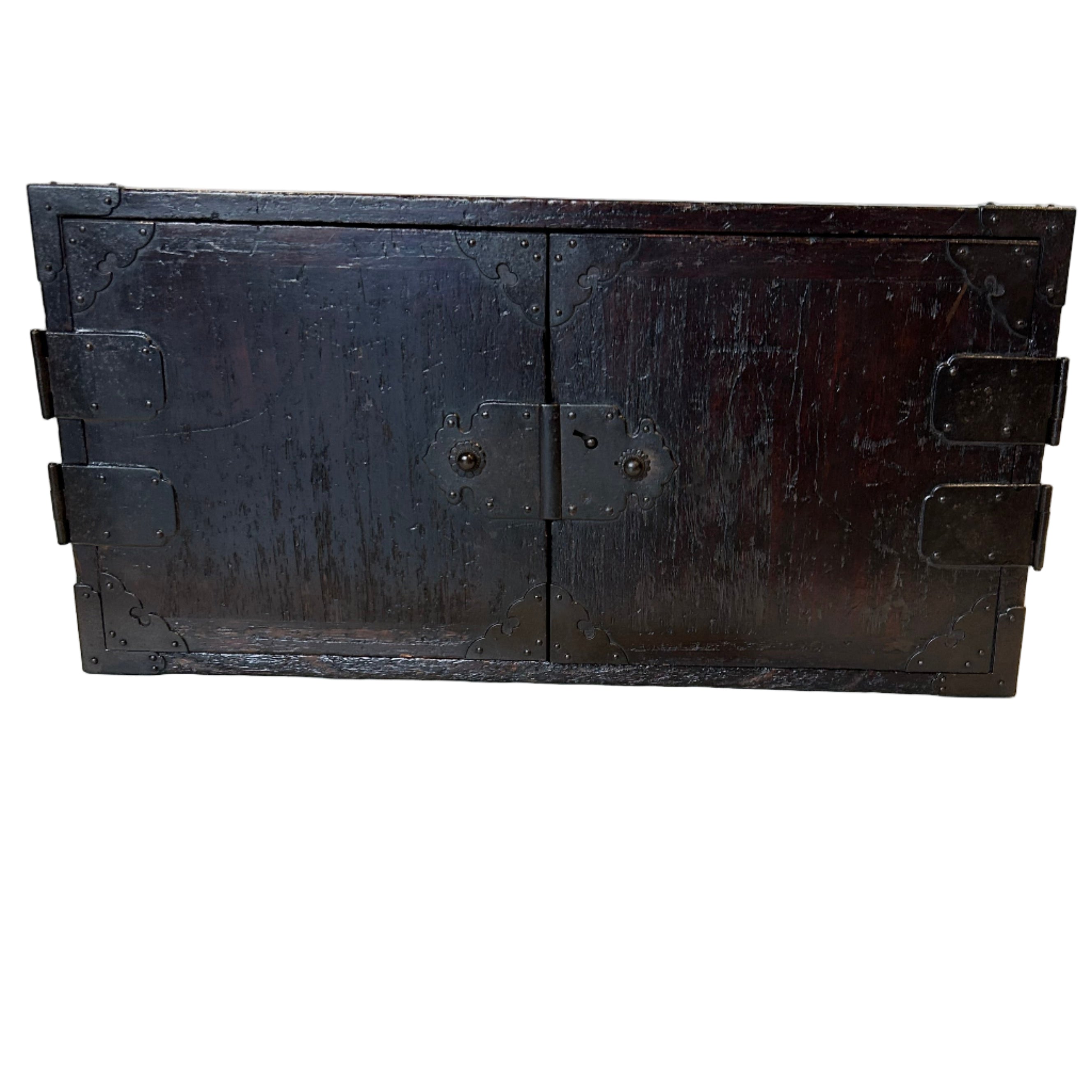 A Japanese accounts chest with double doors for security. Made from paulownia wood with iron hardware. EDO period C1800.