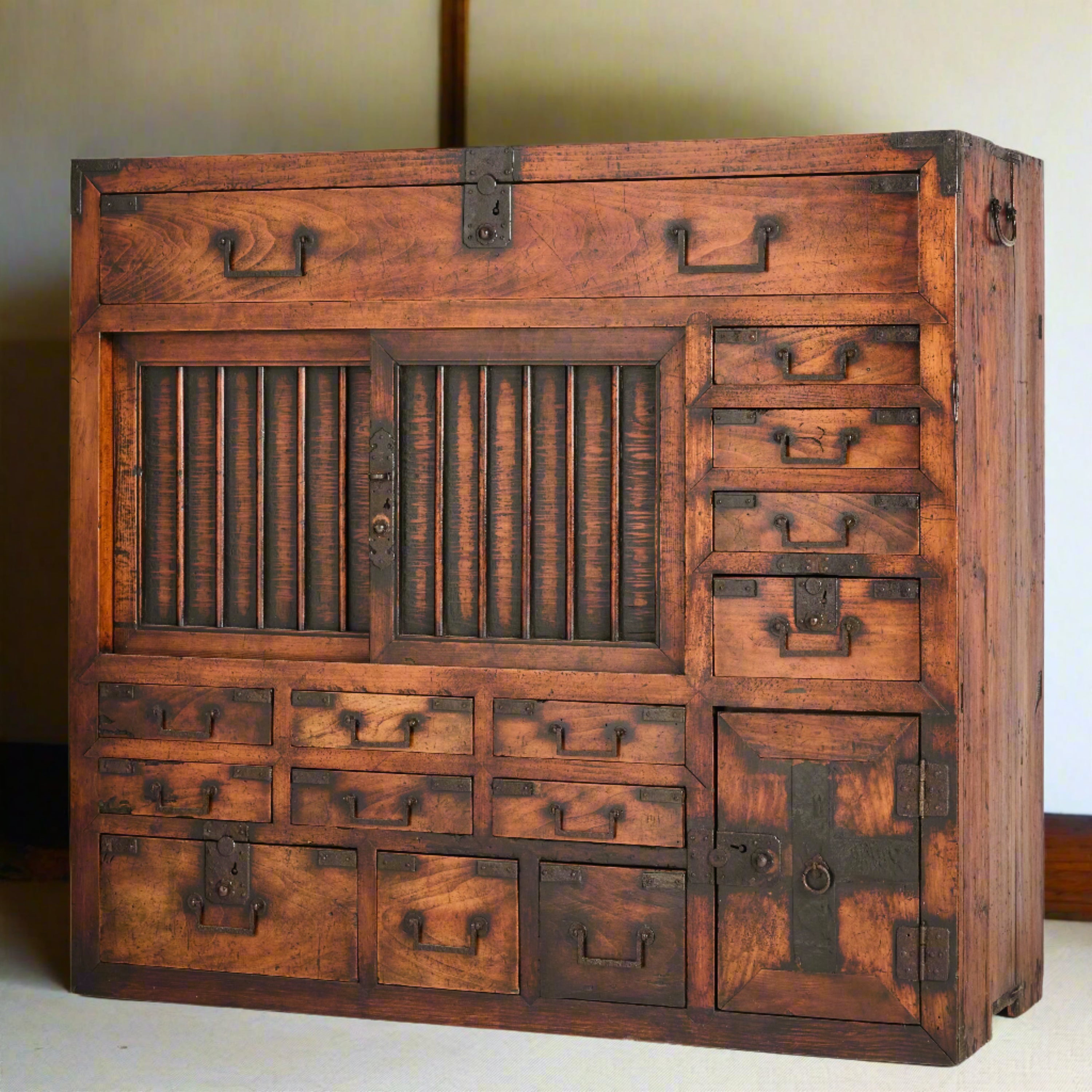 A handsome Japanese shop storage chest (choba-dansu). Made from cypress and cedar woods with iron hardware.&nbsp; EDO period C1840.