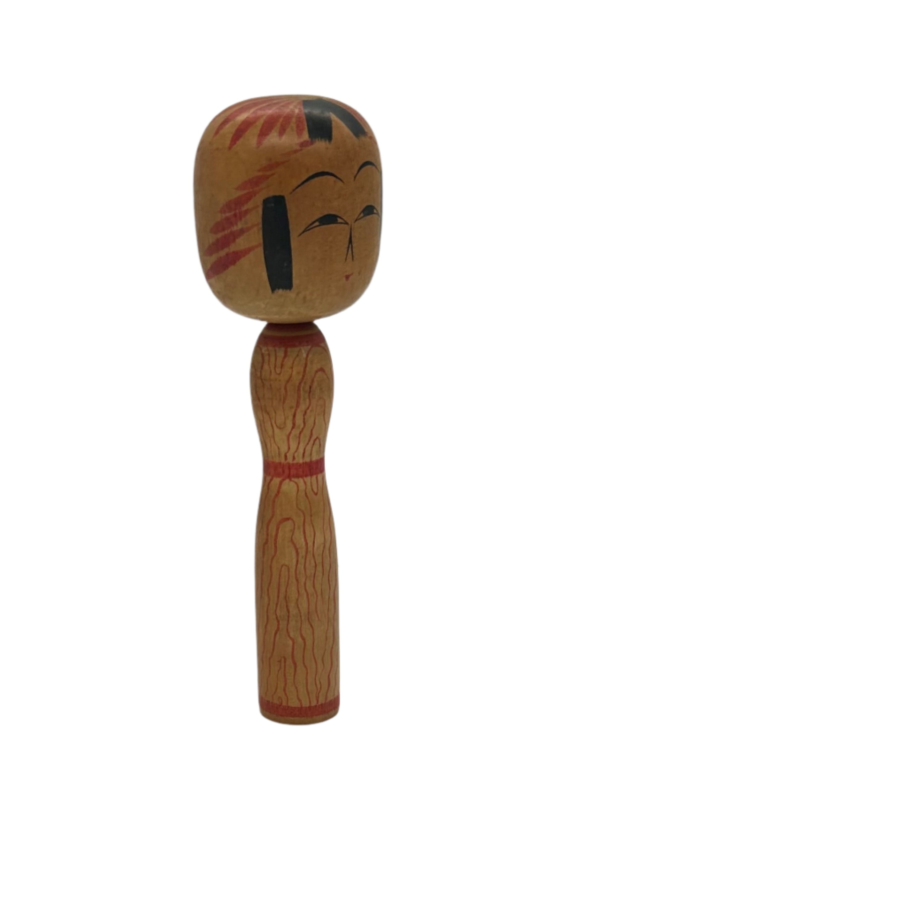 A small vintage traditional Japanese kokeshi. She has an individual pattern on her torso. Signed on the base. KC25003