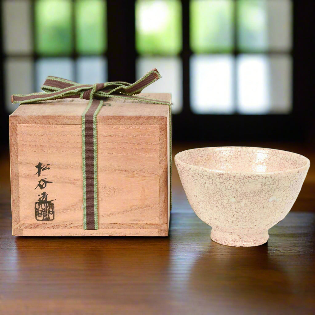 A Japanese Shino pottery tea bowl with an organic shape and feel.
This item comes with its original box.