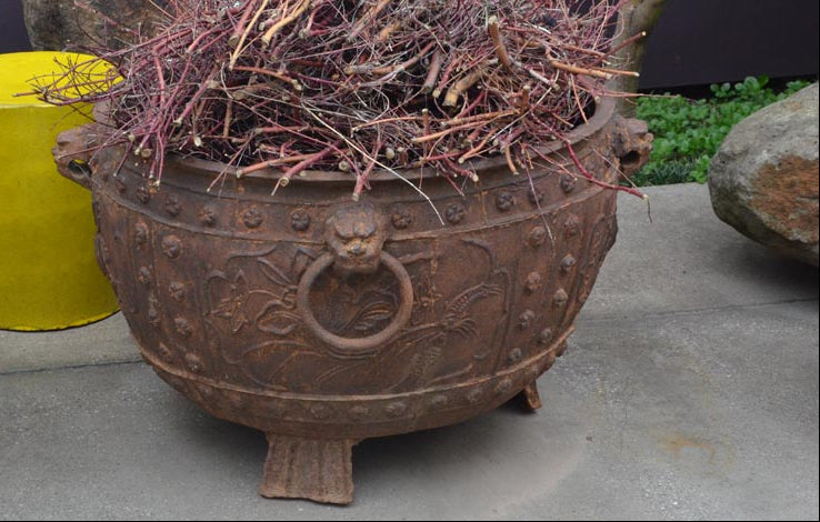 A large Chinese cast iron incense burner from a Buddhist temple. 18th century. Dimensions: 97cm diameter 60cm high