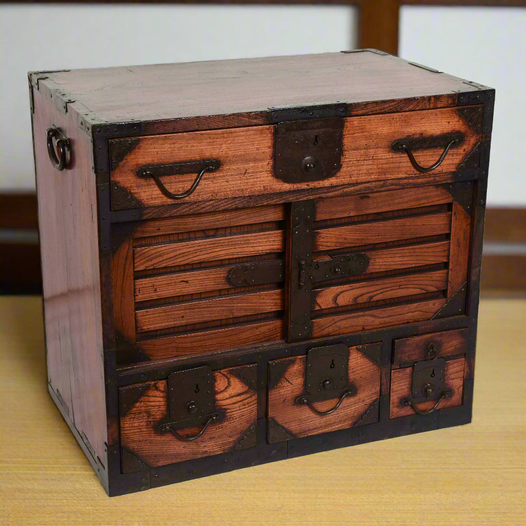 Japanese fune dansu - sea chest for a sea captain's documents and valuables including a writing box. Made from zelkova wood, paulownia wood drawer linings and iron hardware.
Edo period, early 19th century.