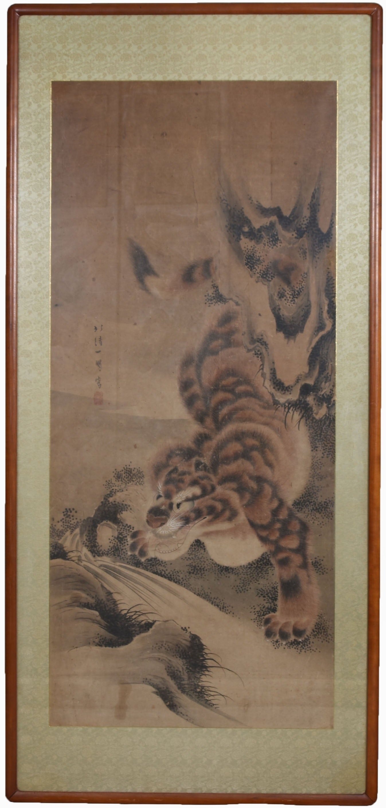 Antique Japanese Sumi-e ink painting of a tiger with a Kishi Ganku style, featuring a tiger in motion, predominantly in shades of black and white, with a luxurious silk brocade border.