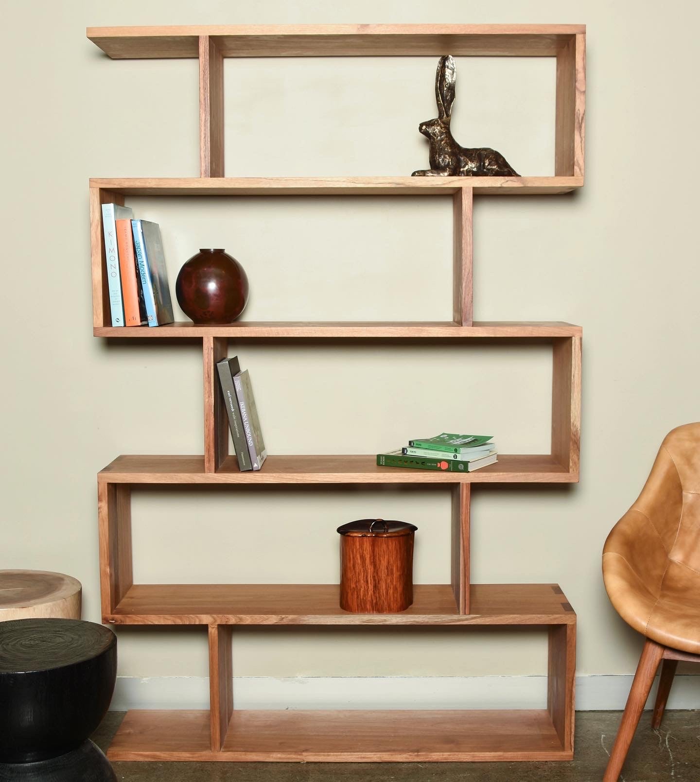 A contemporary bookcase influenced by Scandinavian simplicity and made by highly skilled craftsmen. Elegant and tall with a natural finish. Japandi
