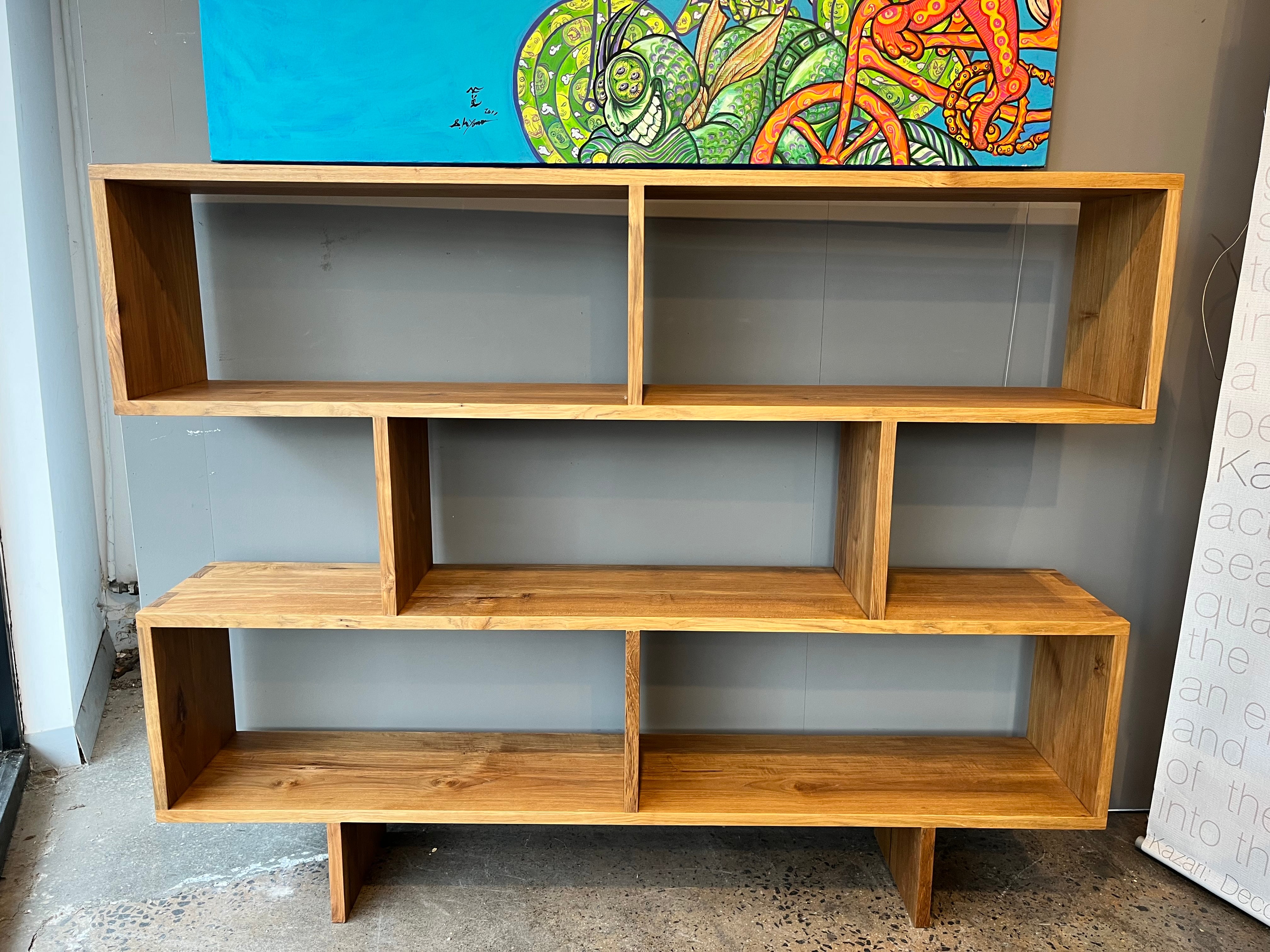 A contemporary bookcase influenced by Scandinavian simplicity and made by highly skilled craftsmen. Elegant, low and wide with a natural wax finish.
Materials: sustainably sourced solid teak