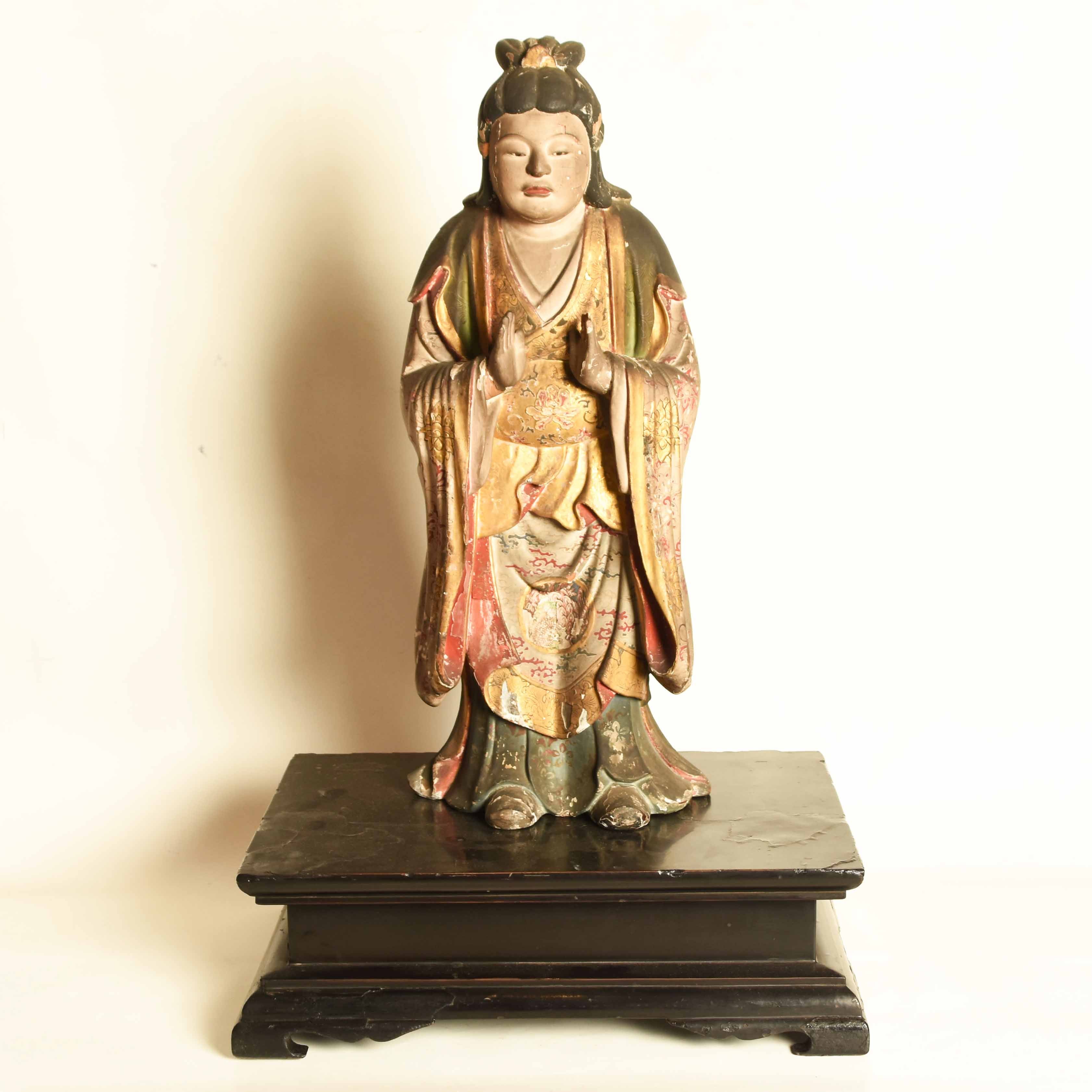 A very old Japanese statue of a Shinto god from the Momoyama period (1568-1600). Hand carved from wood with a layer of gesso and hand painted
