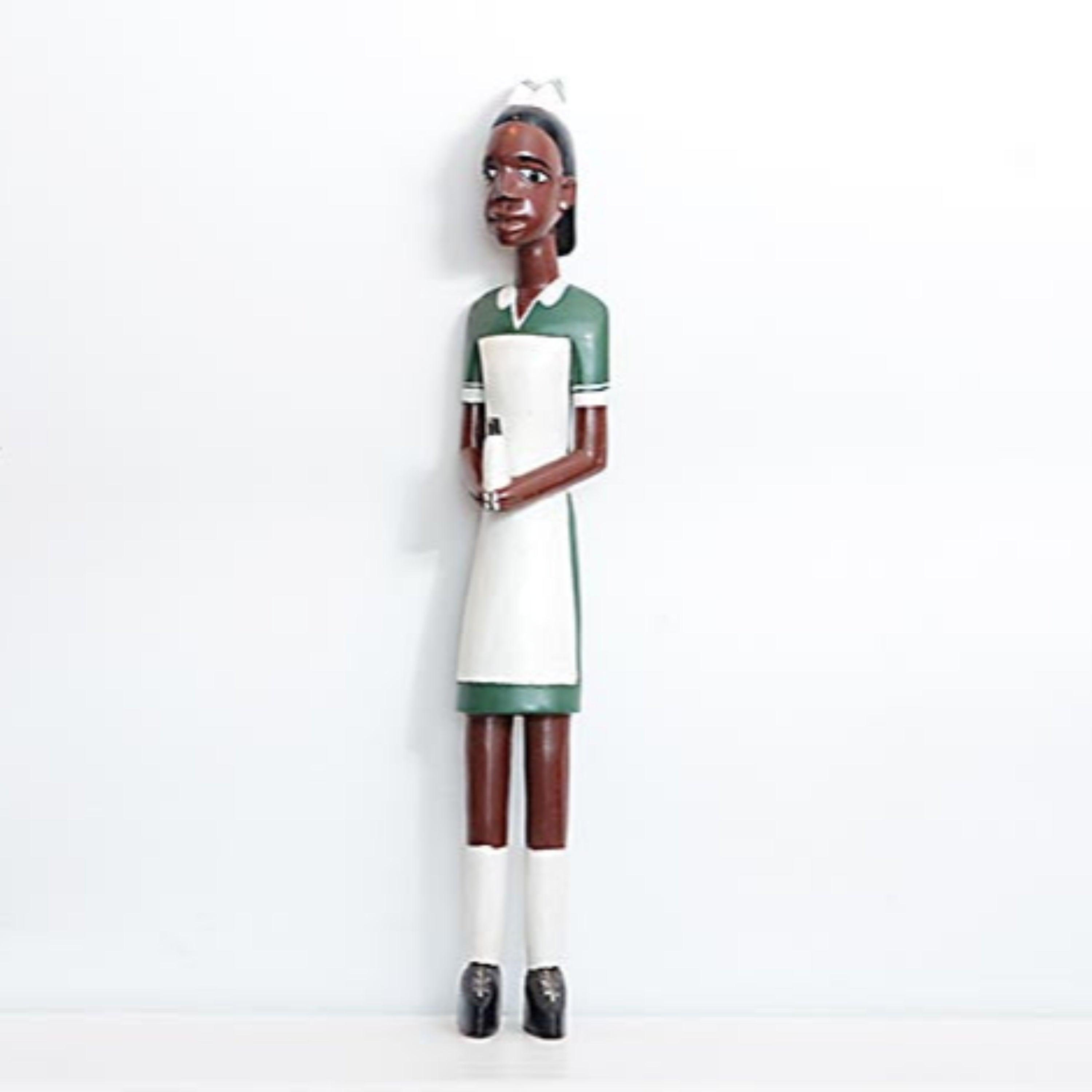Contemporary colonial wooden statue of a Nurse, from Ghana.